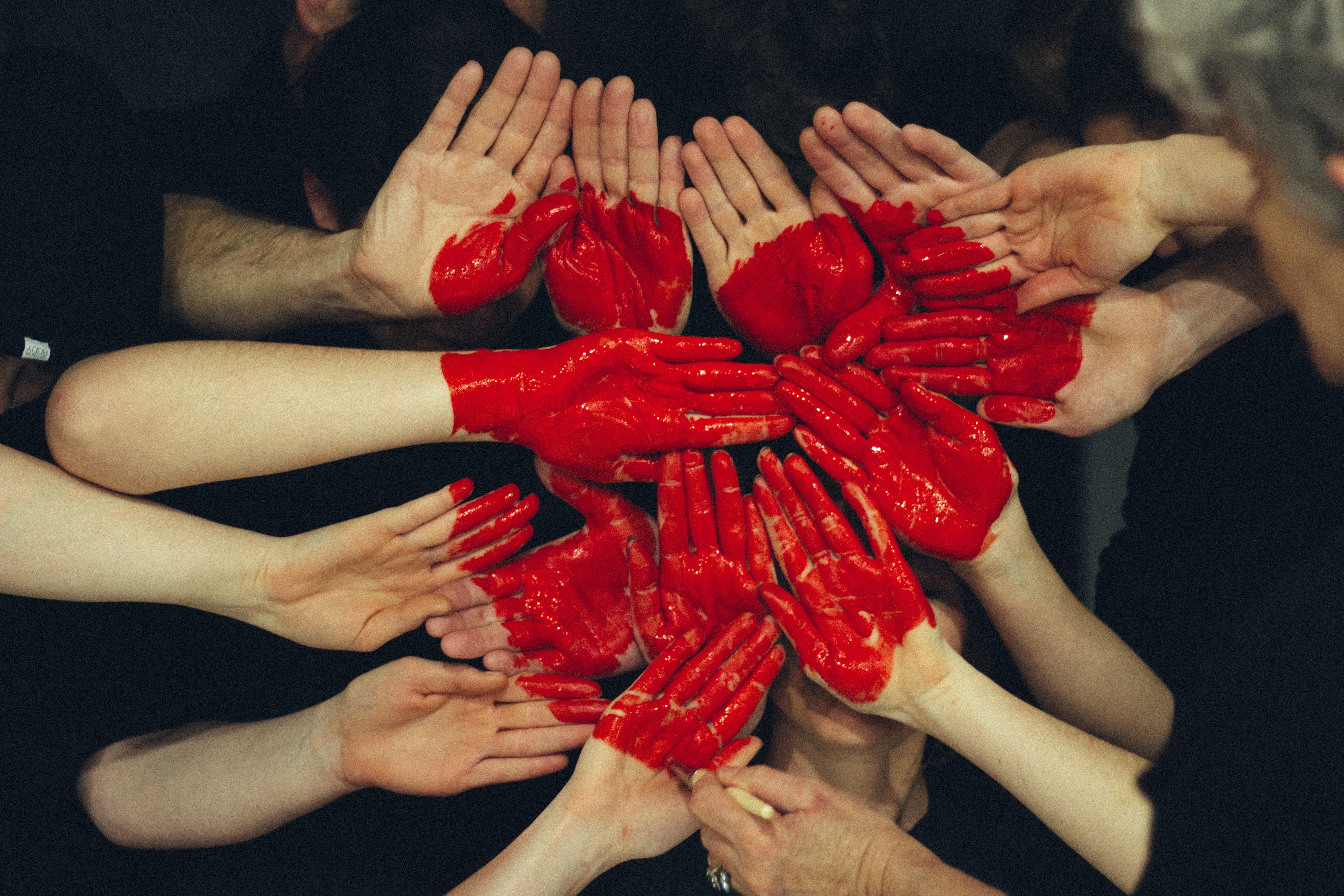 Heart painted on hands | Unsplash