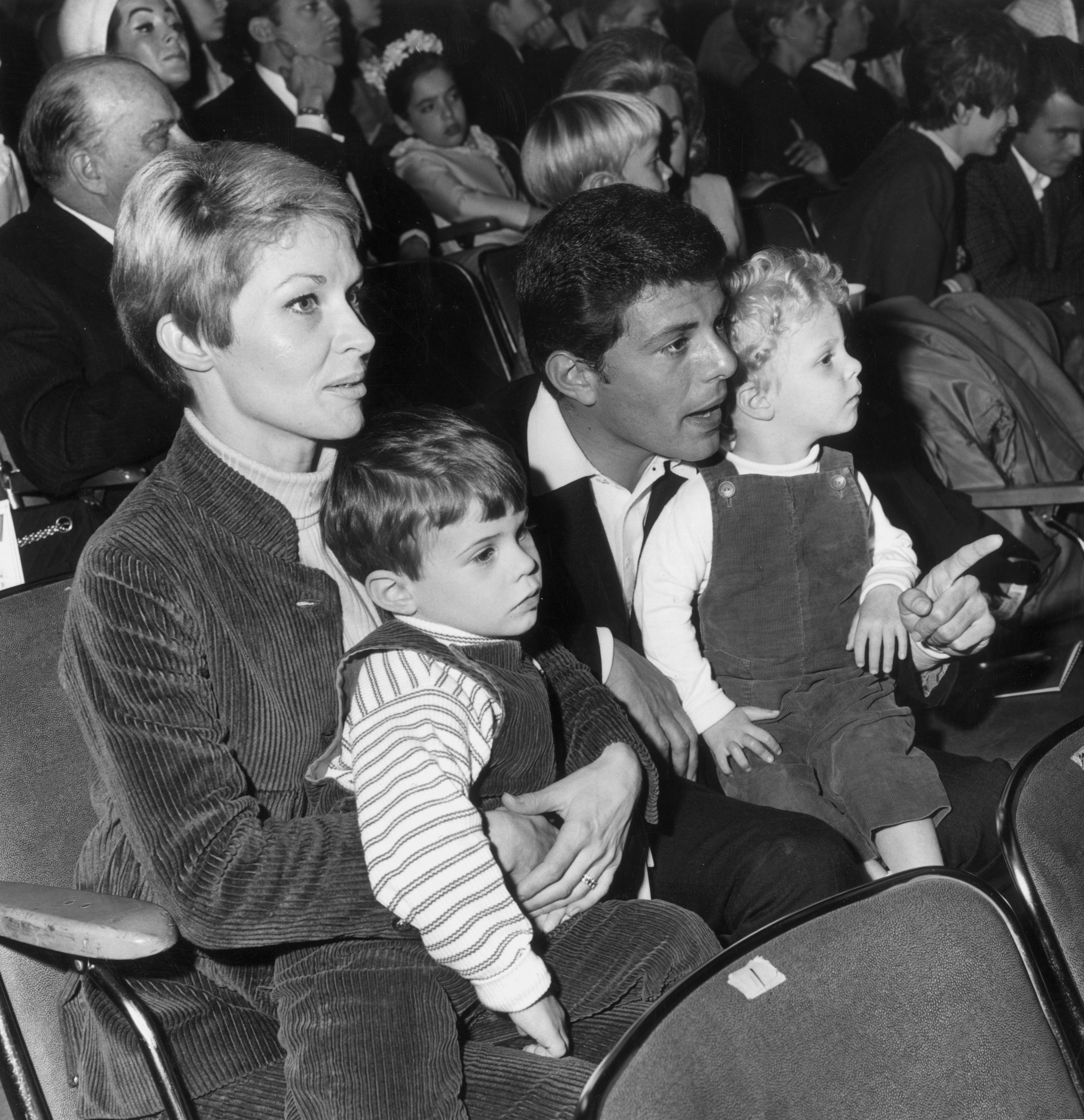 American actor and singer Frankie Avalon sits in the audience with his wife, Kathryn, and their two sons, as they attend the Dobritch International Circus on 16th March 1967. | Source: Getty Images