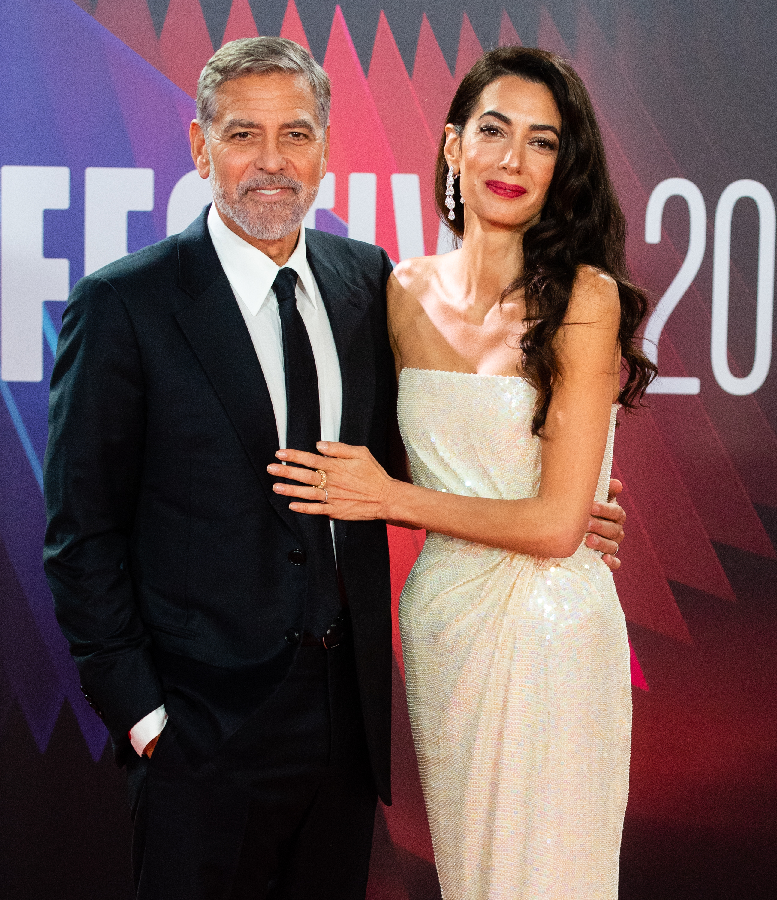George Clooney and Amal Clooney in London, England on October 10, 2021 | Source: Getty Images