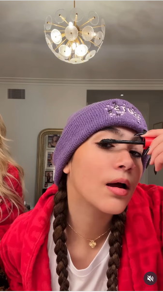 Mariah Carey's 14-year-old daughter, Monroe applying mascara on her lashes from a video posted on August 5, 2025 | Source: Instagram/mariahcarey