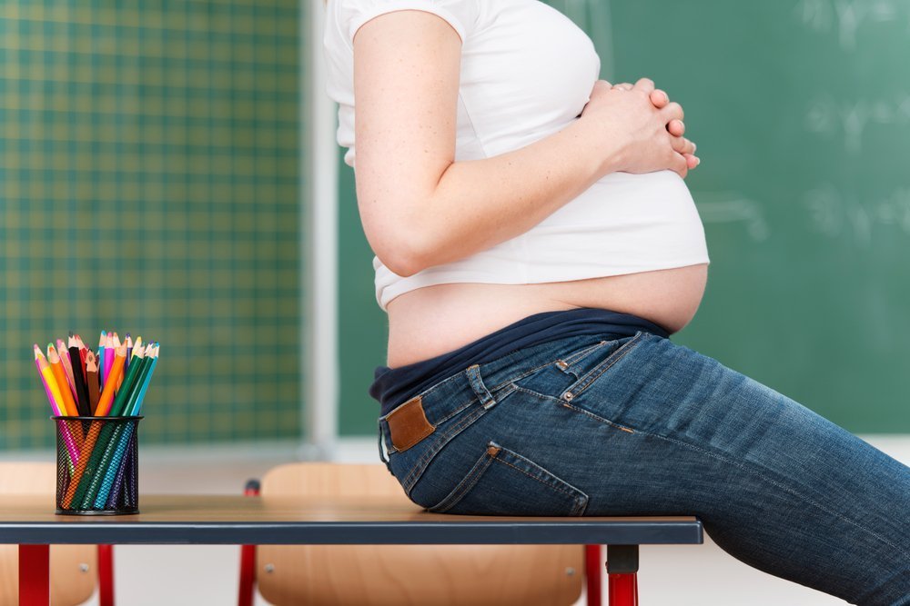 Pregnant school teacher | Shutterstock