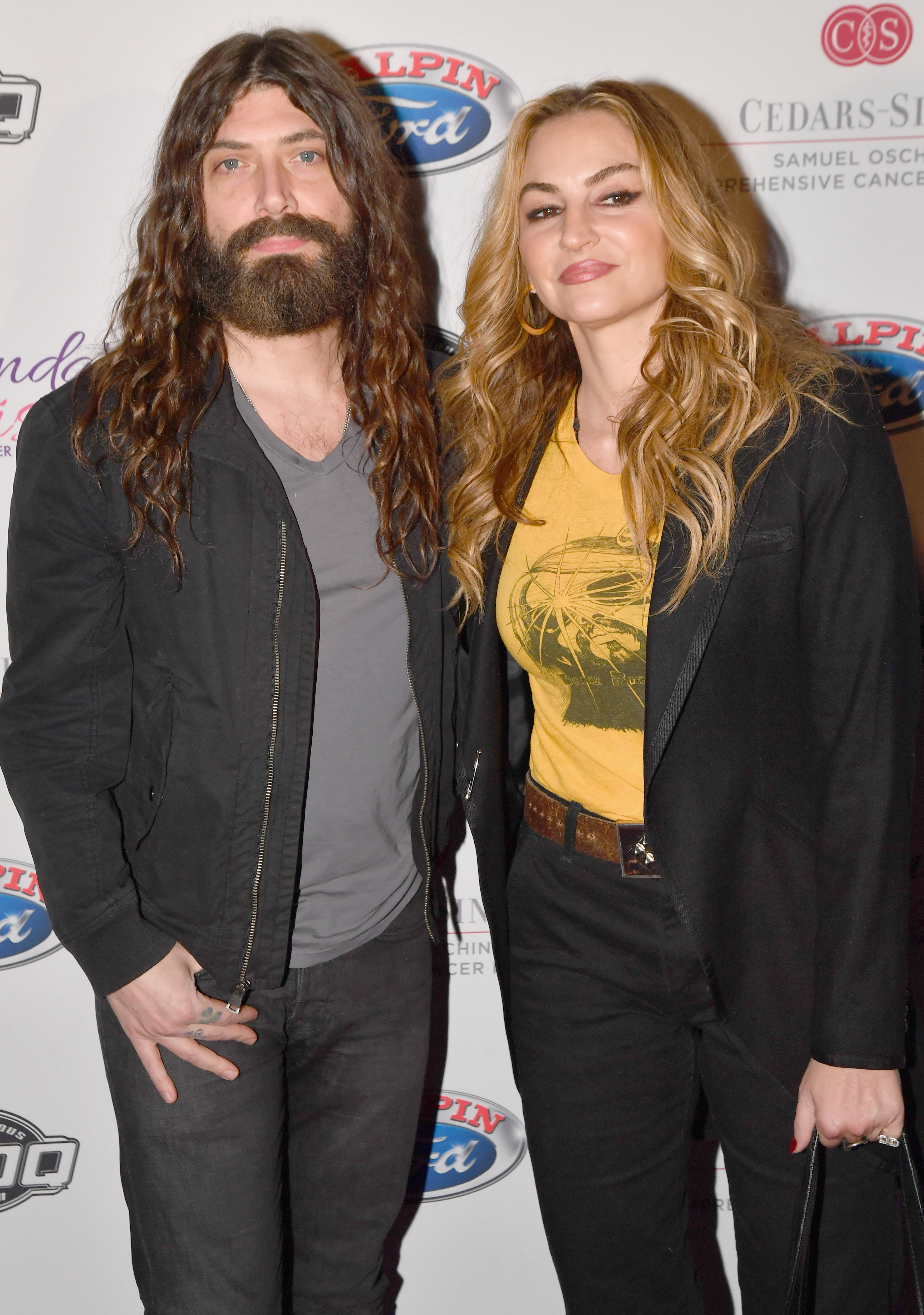 Michael Devin and Drea de Matteo attend the 2017 Rhonda's Kiss Benefit Concert at Hollywood Palladium on December 8, 2017, in Los Angeles, California. | Source: Getty Images