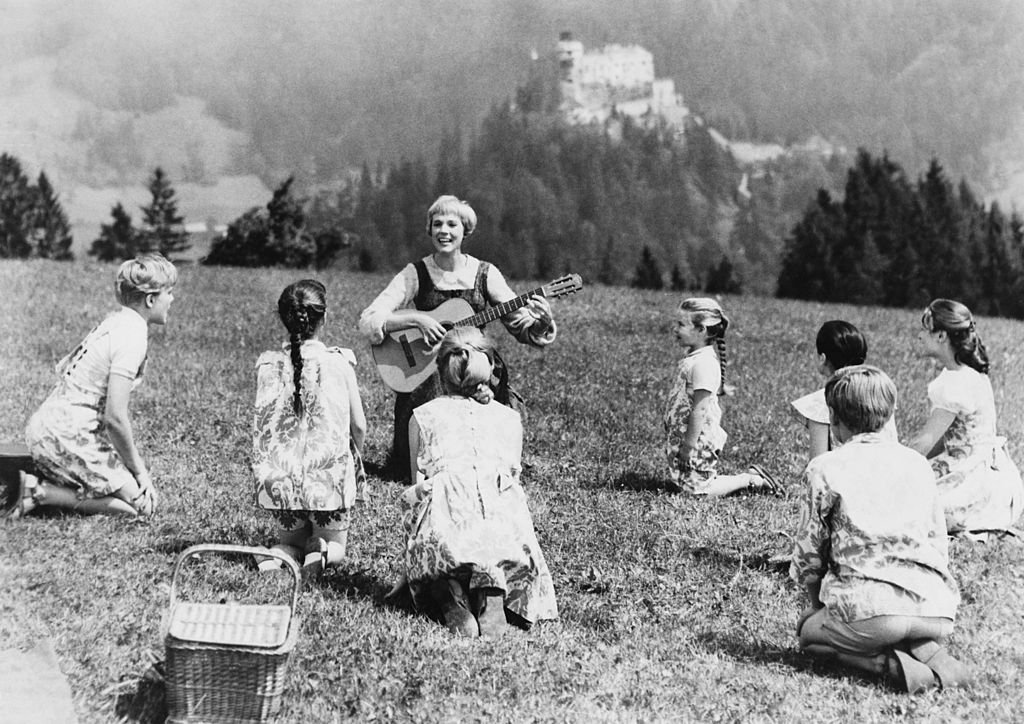 British film actress Julie Andrews, centre, with the children in a still from the film "The Sound of Music"., 1965 | Photo: Getty Images