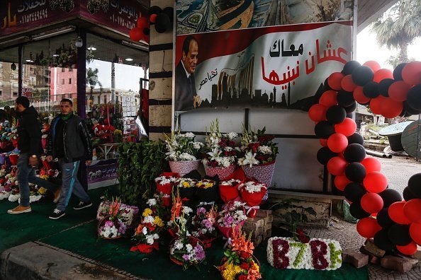 An Egyptian man selling flowers at a flower shop on Valentine's Day in Egypt | Photo: Getty Images
