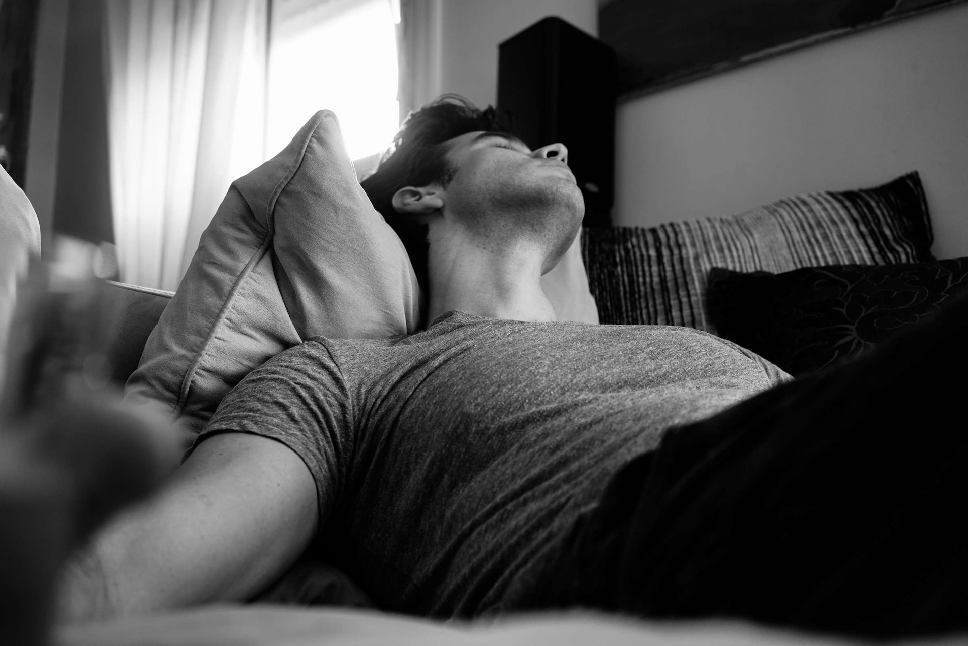 Man asleep in bed | Source: Unsplash