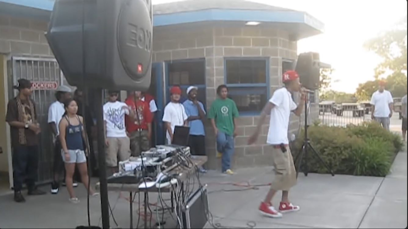 Wiz Khalifa performs at an outdoor show during the early stages of his music career in Episode 1 of "Behind the Cam." | Source: YouTube/Wiz Khalifa