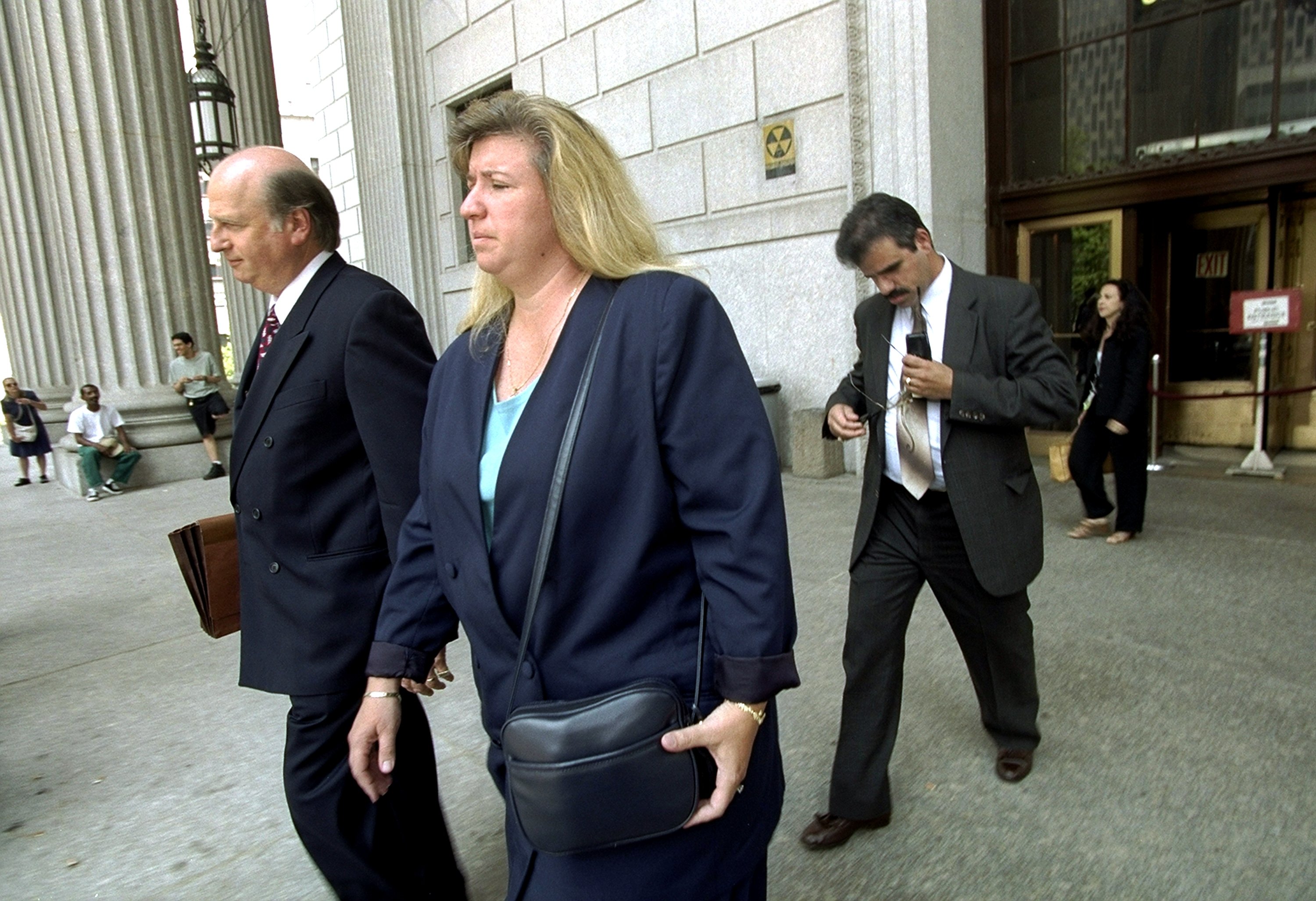 Donna Fasano and her husband Richard leave court. | Source: Getty Images