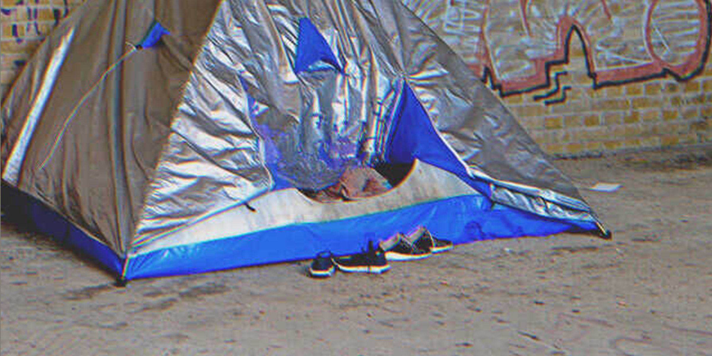 Shoes outisde a tent. | Shutterstock