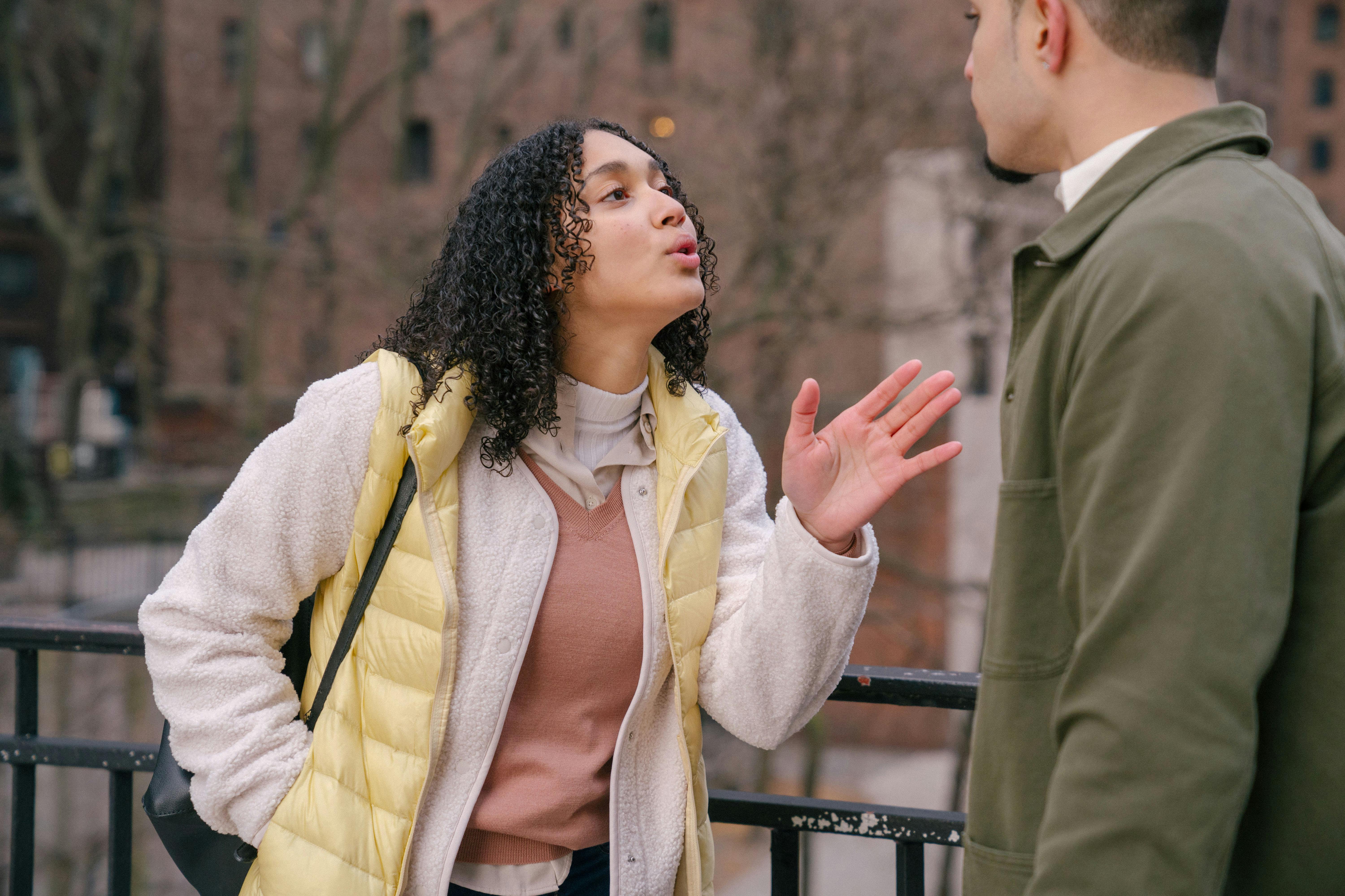 A couple arguing outside | Source: Pexels