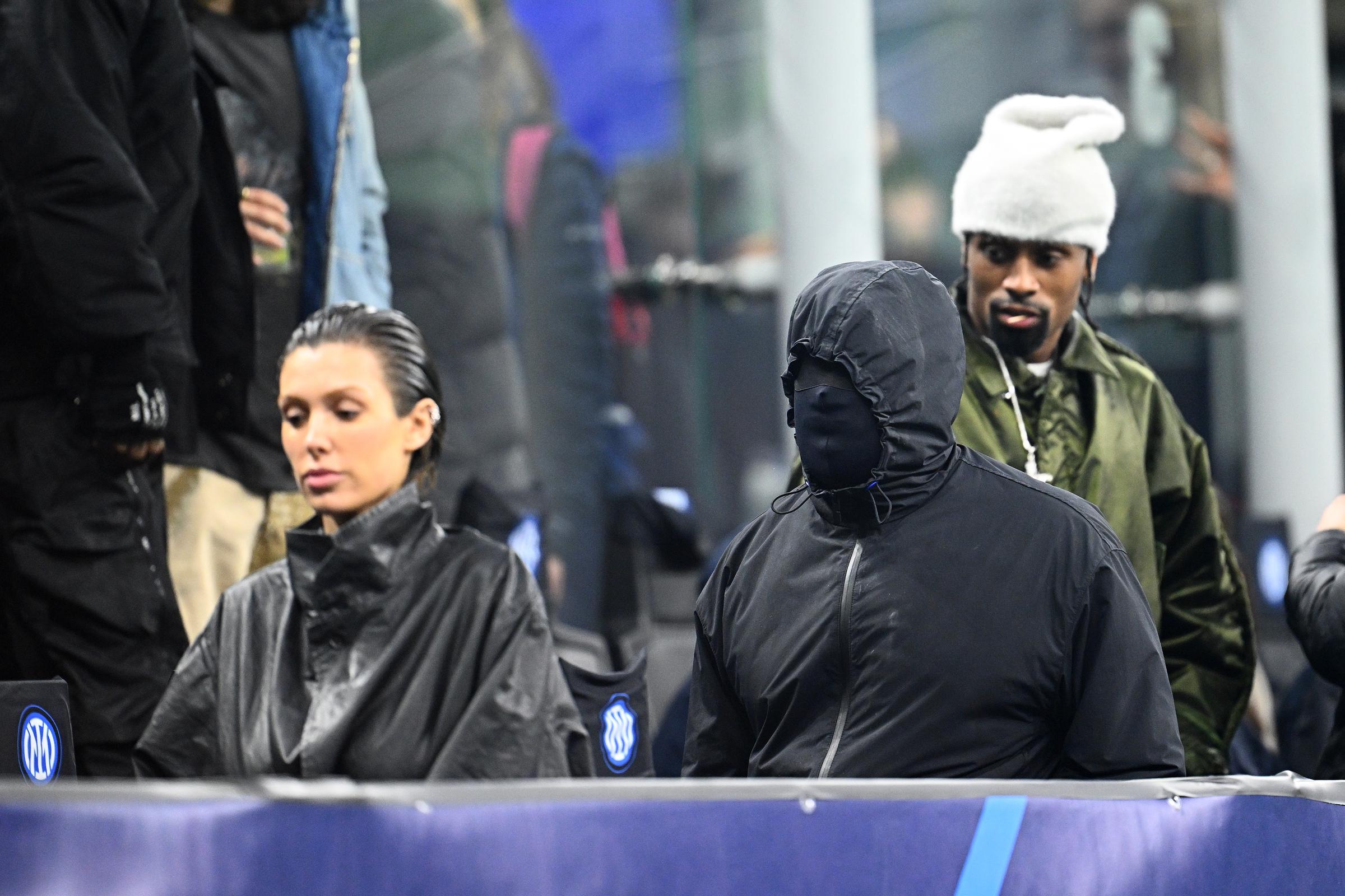 Bianca Censori and Kanye West seen during the UEFA Champions League 2023/24 round of 16 first leg match on February 20, 2024, in Milan, Italy | Source: Getty Images