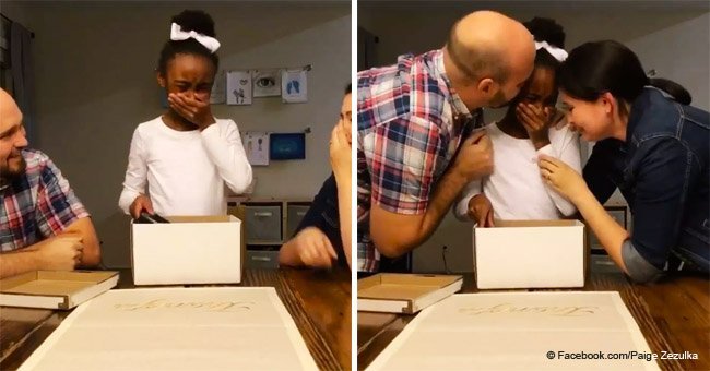 Bittersweet moment girl bursts into tears when she hears she's being adopted