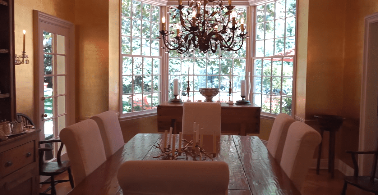 The dining room of Donna Mills' English-style cottage house | Source: YouTube/@LosAngelesTimes