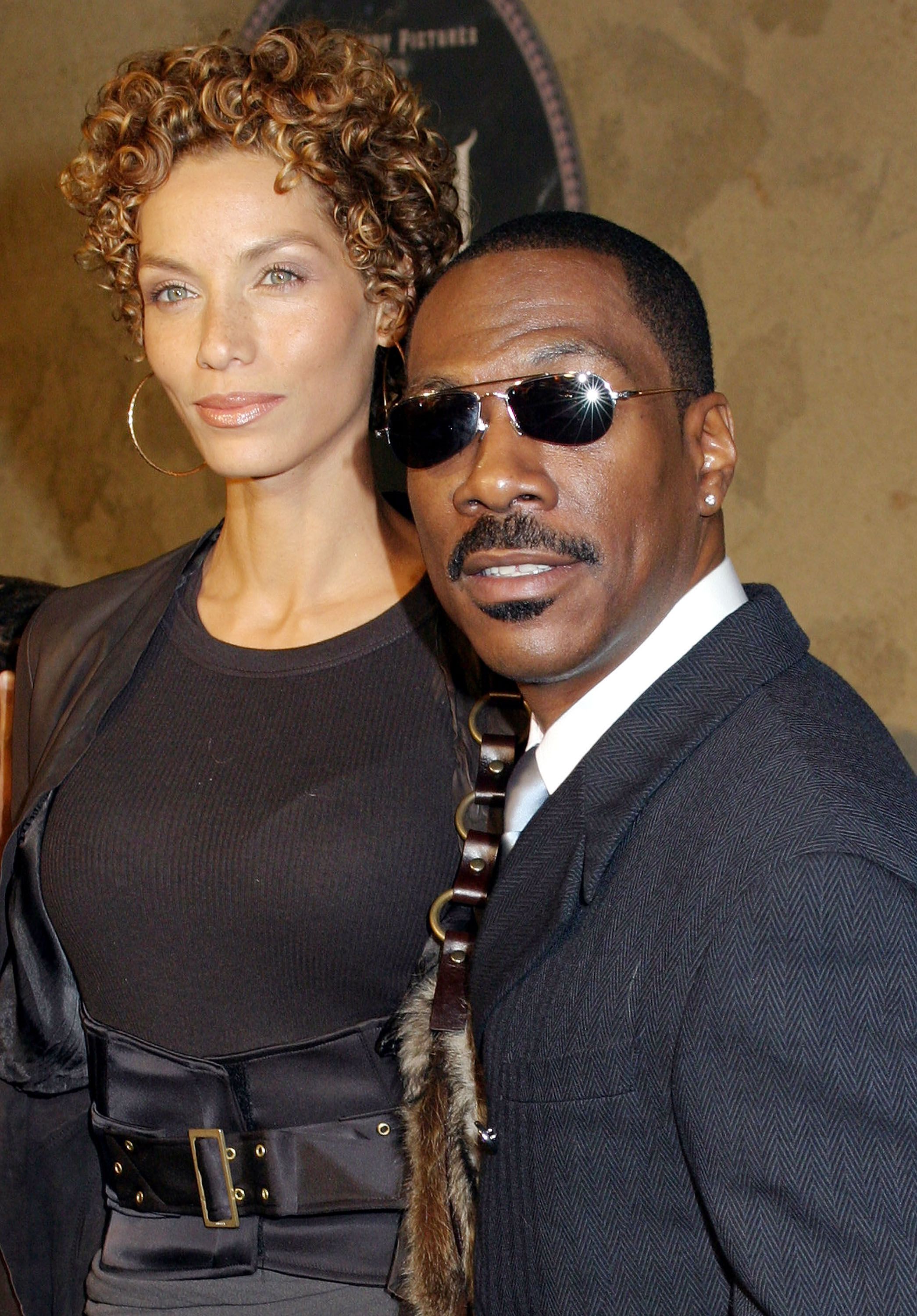 Eddie Murphy and Nicole Murphy at the world film premiere of "The Haunted Mansion" at the El Capitan Theatre on November 23, 2003 in Hollywood, California | Photo: Getty Images  