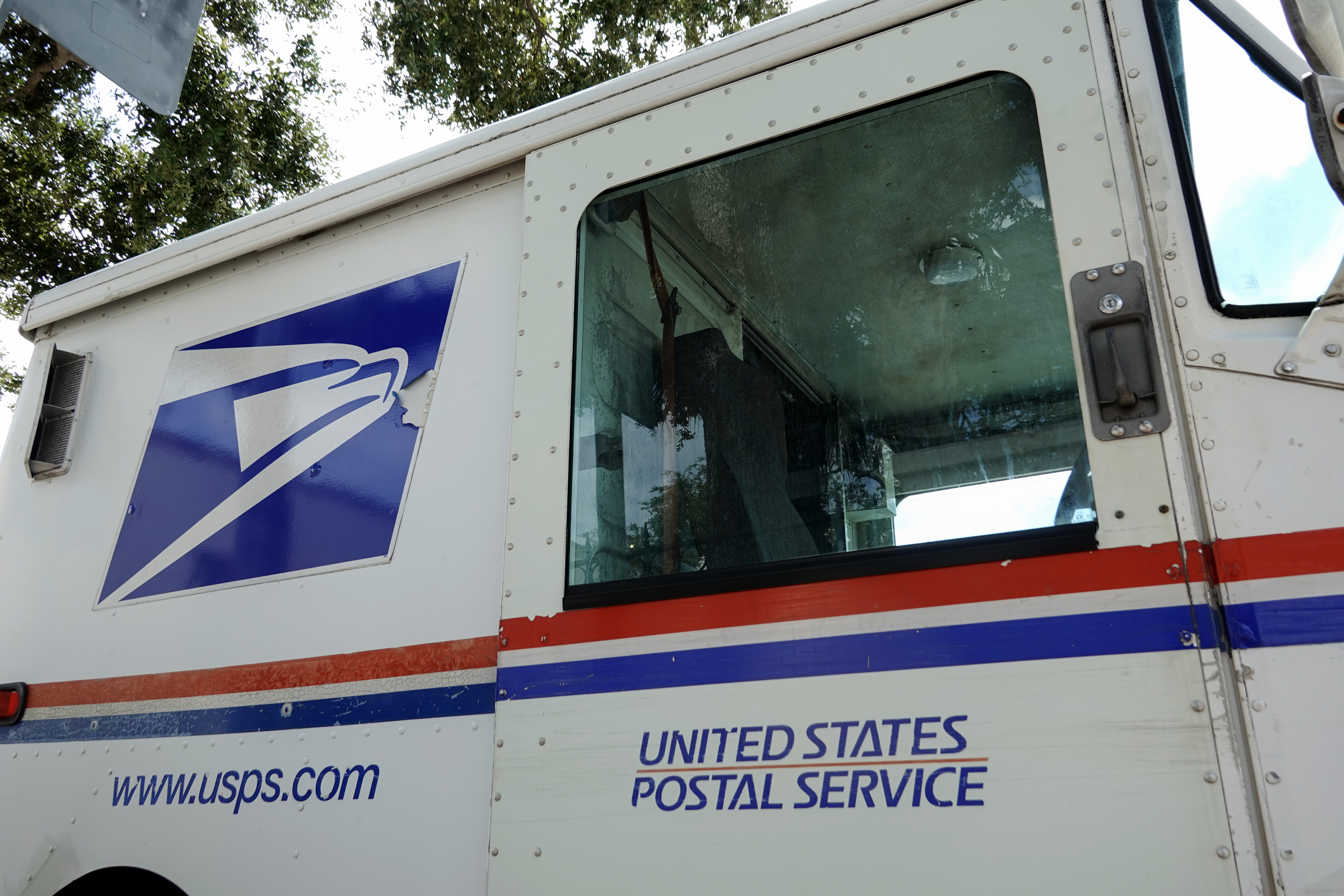 A United States Postal Service truck is used to deliver mail on September 12, 2024, in Miami Beach, Florida | Source: Getty Images