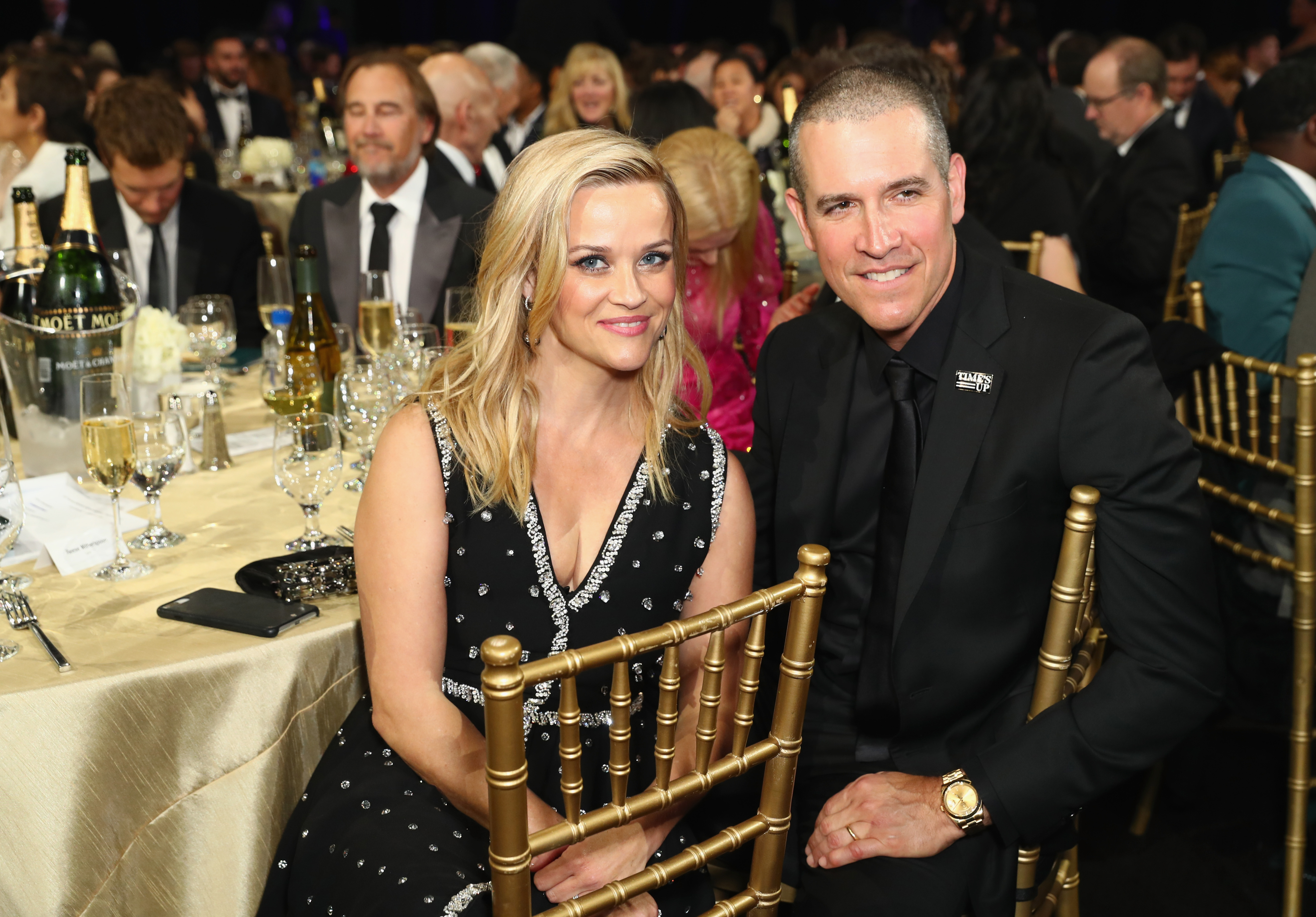 Actor Reese Witherspoon (L) and Jim Toth attend the 23rd Annual Critics' Choice Awards on January 11, 2018 in Santa Monica, California | Source: Getty Images