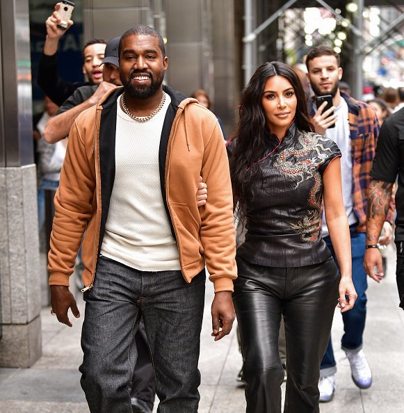 Kanye West and Kim Kardashian West walk along 57th Street on October 25, 2019 | Photo: Getty Images
