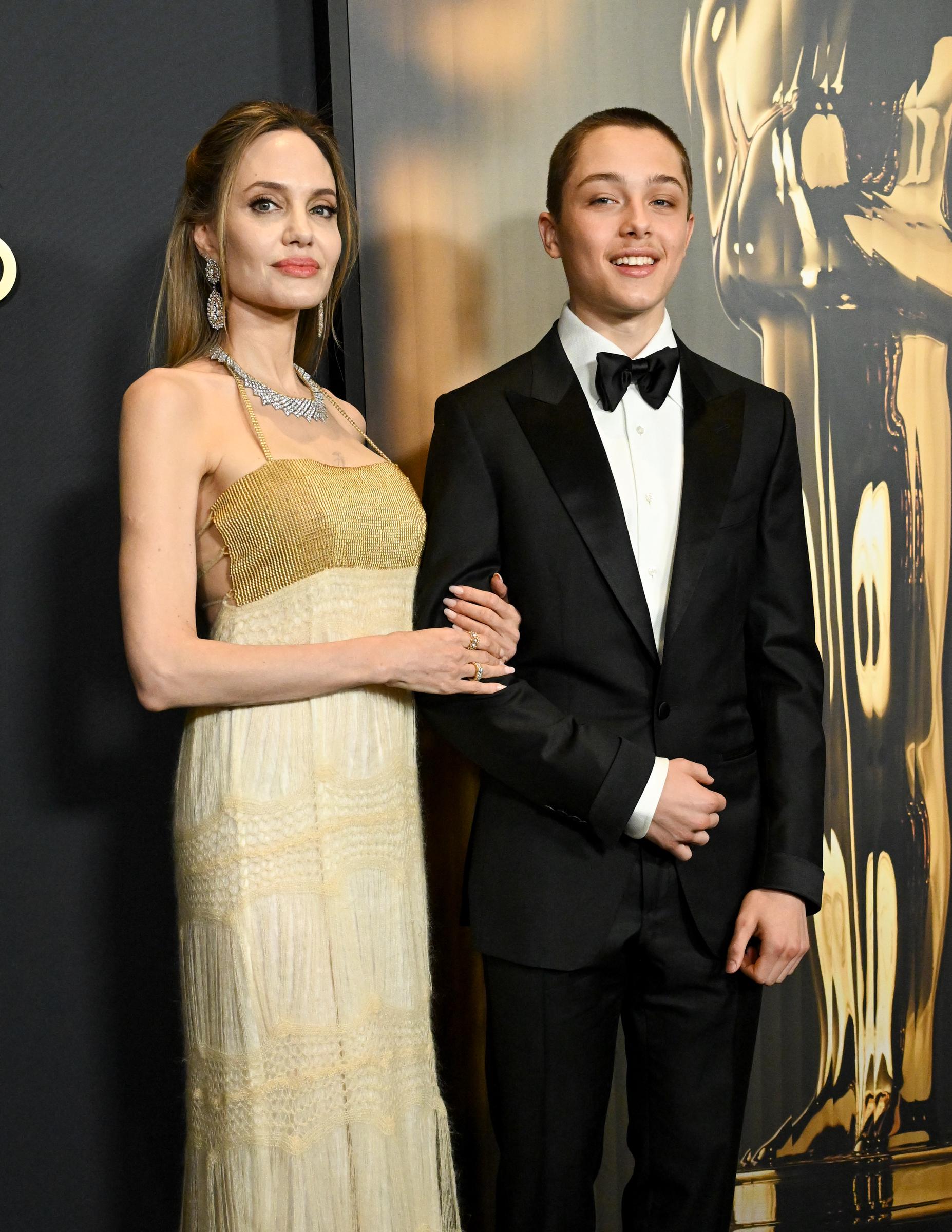 Angelina Jolie and Knox Jolie-Pitt attend the 15th Governors Awards held at the Ray Dolby Ballroom at Ovation Hollywood on November 17, 2024, in Los Angeles, California.