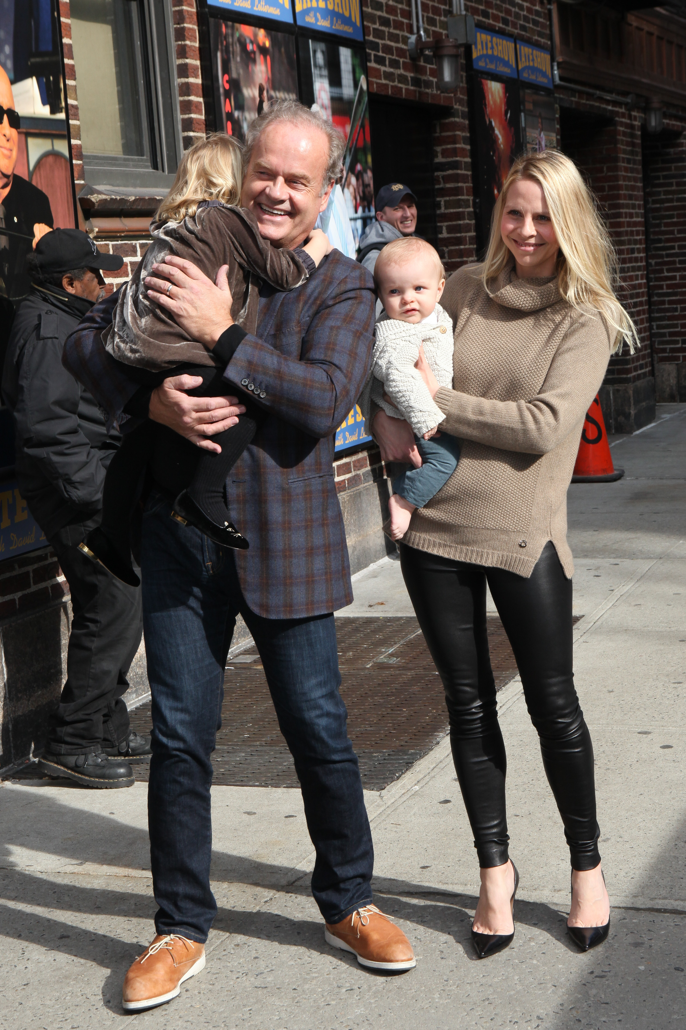 Kelsey Grammer and Kayte Grammer with children Faith Grammer and Kelsey Gabriel Elias Grammer at the "Late Show With David Letterman" on March 11, 2015 in New York City | Source: Getty Images