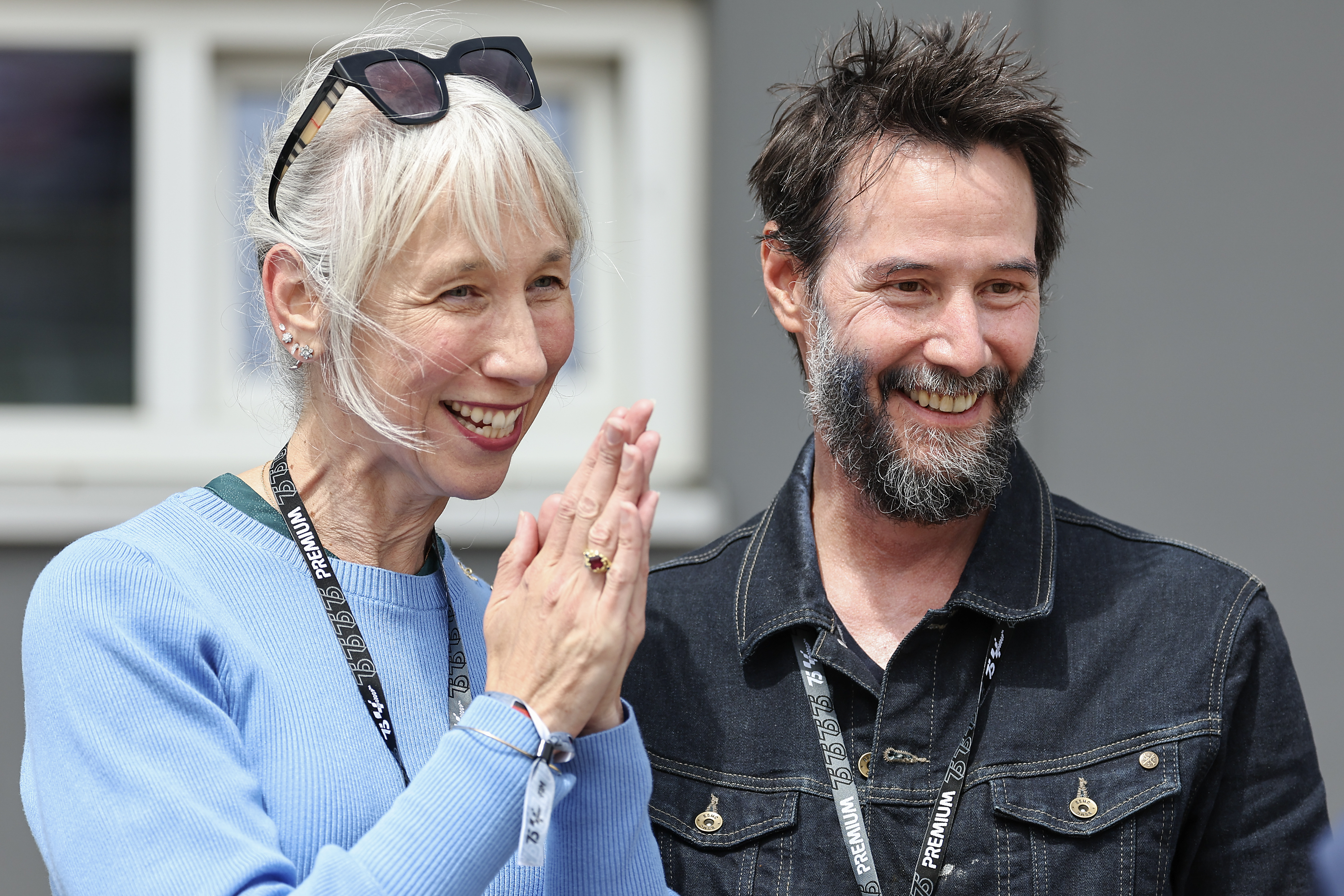 Alexandra Grant and Keanu Reeves at the MotoGP of Germany at Sachsenring Circuit in Hohenstein-Ernstthal on July 7, 2024. | Source: Getty Images