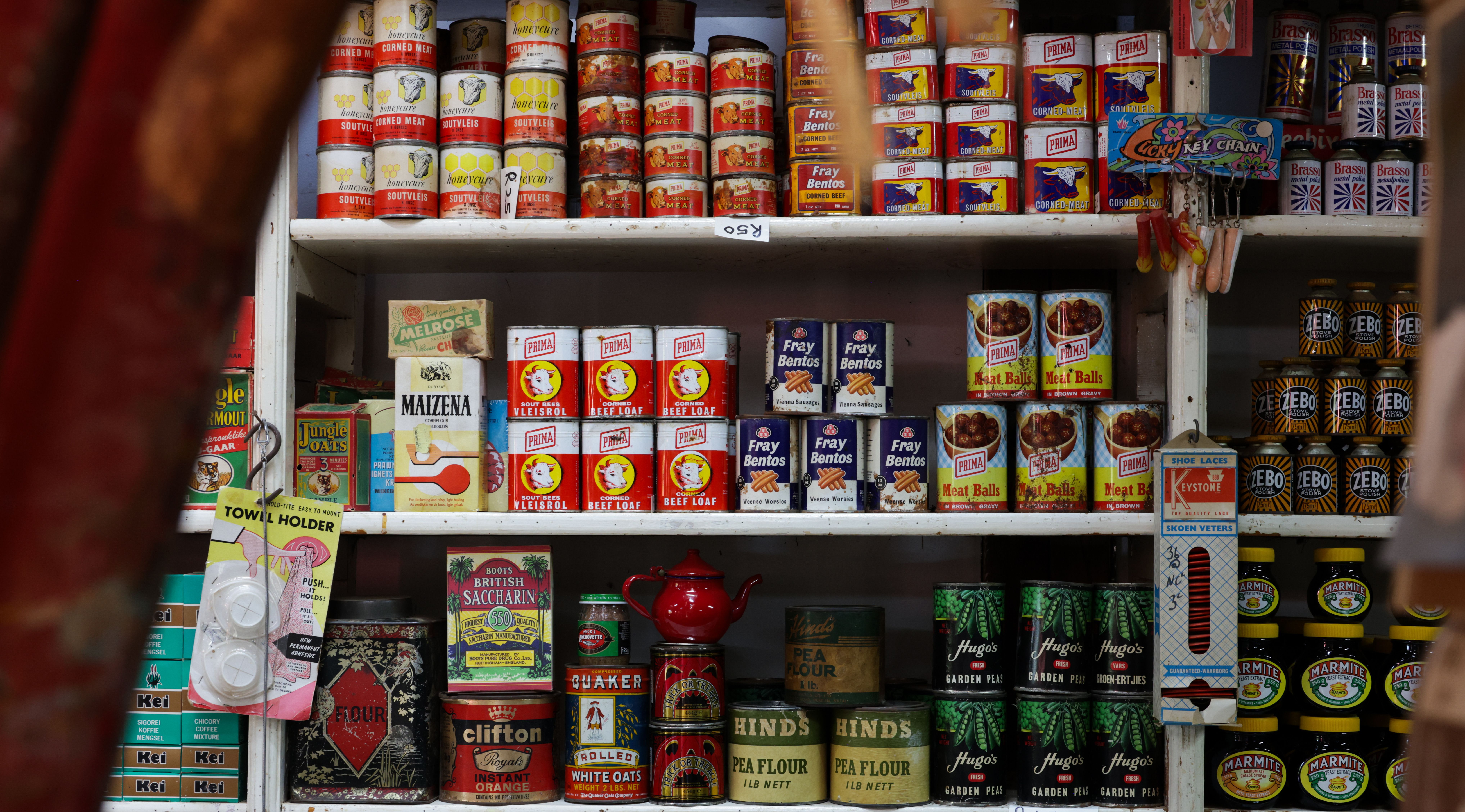 Canned goods in a pantry | Source: Pexels