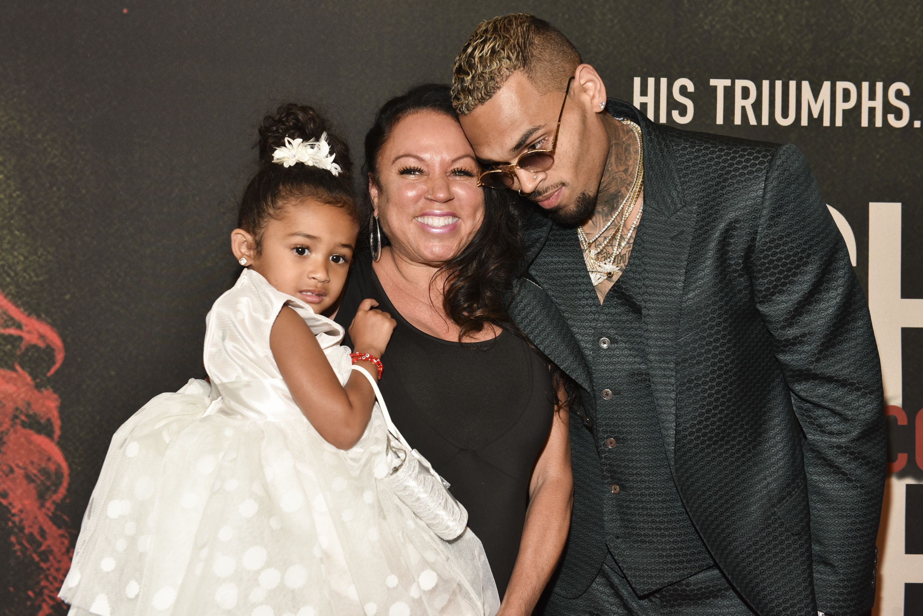 Chris Brown, Joyce Hawkins, and Royalty Brown at the premiere of "Chris Brown: Welcome to My Life" at Regal LA Live Stadium 14 on June 6, 2017 | Photo: Getty Images