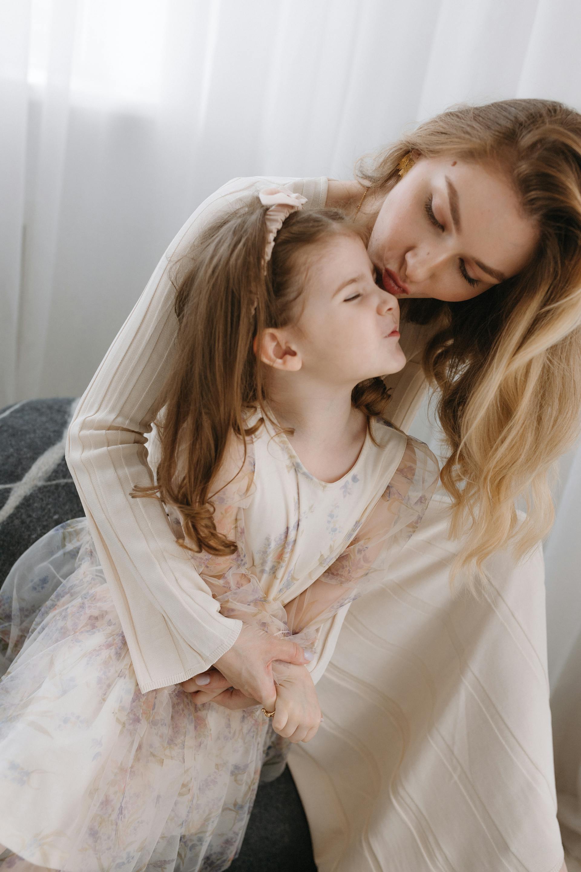 A mother and daughter sharing a sweet moment | Source: Pexels