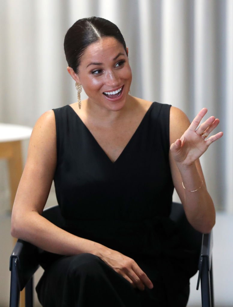 Meghan, Duchess of Sussex speaks with 12 inspiring female entrepreneurs as she visits Woodstock Exchange, a women founders/social entrepreneurs event during her royal tour of South Africa with Prince Harry, Duke of Sussex | Photo: Getty Images