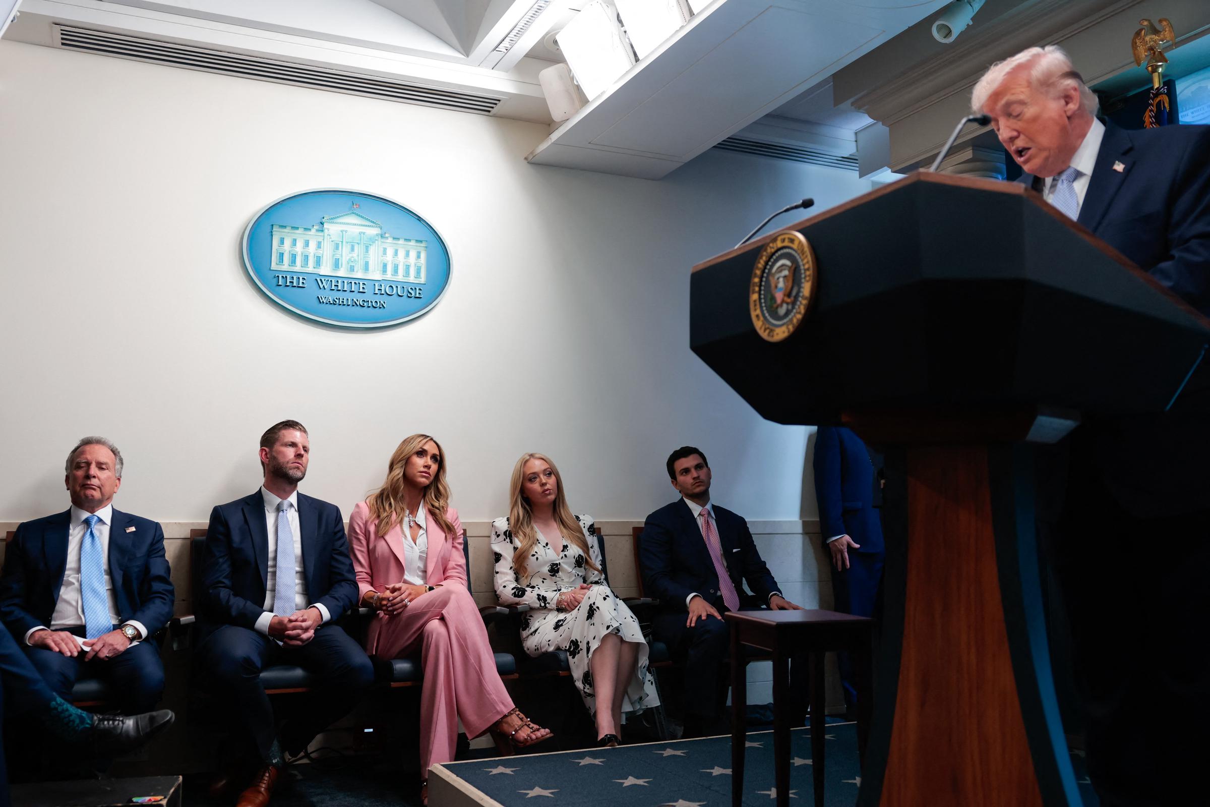 US Special Envoy for the Middle East Steve Witkoff, Eric, Lara, Tiffany Trump, and Michael Boulos listen as Donald Trump speaks in the James S. Brady Press Briefing Room of the White House on April 6, 2026, in Washington, DC | Source: Getty Images