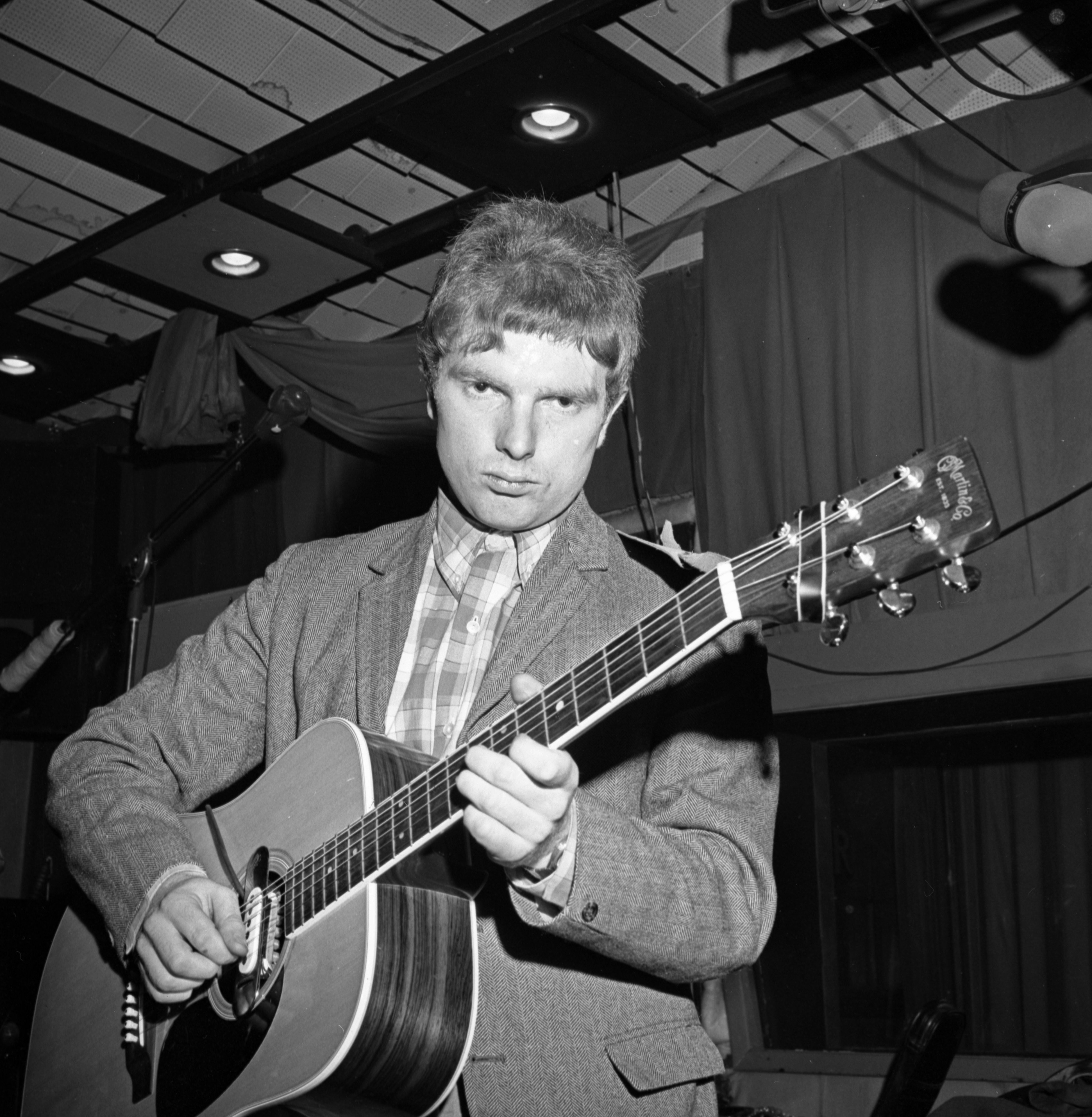 Van Morrison plays an acoustic guitar at a Bang Records recording session on March 28, 1967, in New York, New York. | Source: Getty Images