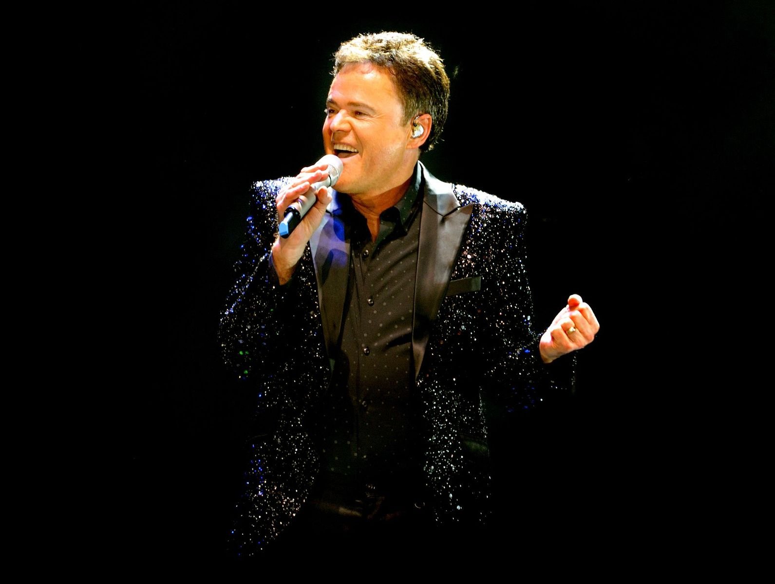 Donny Osmond on stage at Manchester Arena on January 21, 2017 | Photo: Getty Images