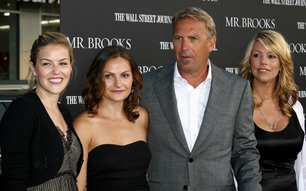 Kevin Costner, wife Christine and his daughters Lily and Annie at the premier of "Mr Brooks" in Los Angeles in 2007 | Photo: Shutterstock