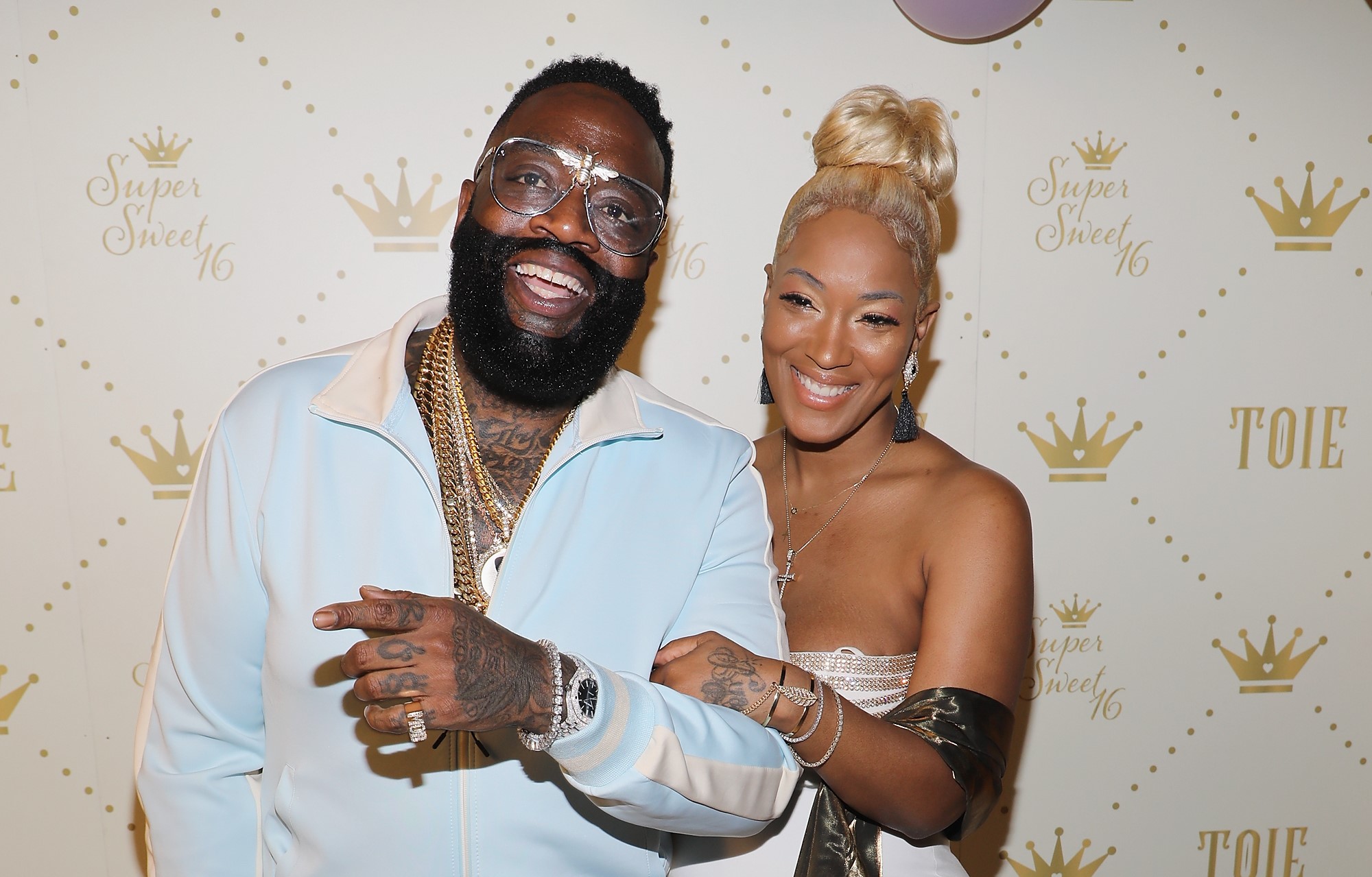 Rick Ross and Briana Camille attend Toie's Royal Court: Super Sweet 16 at Versace Mansion, on April 7, 2018, in Miami, Florida. | Source: Getty Images