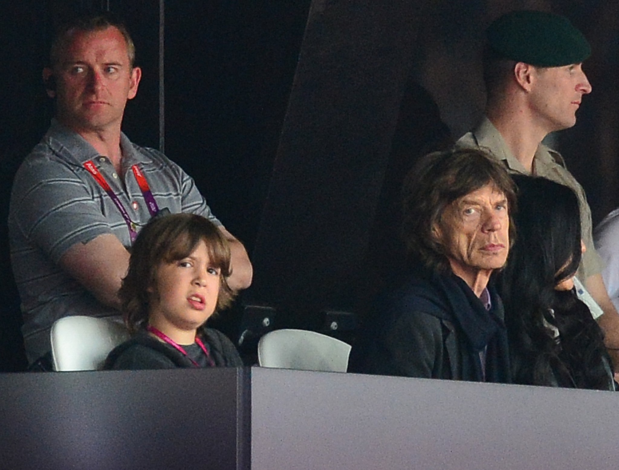 Mick Jagger and his son Lucas Jagger attend the athletics event of the London 2012 Olympic Games on August 6, 2012 in London ┃ Source: Getty Images