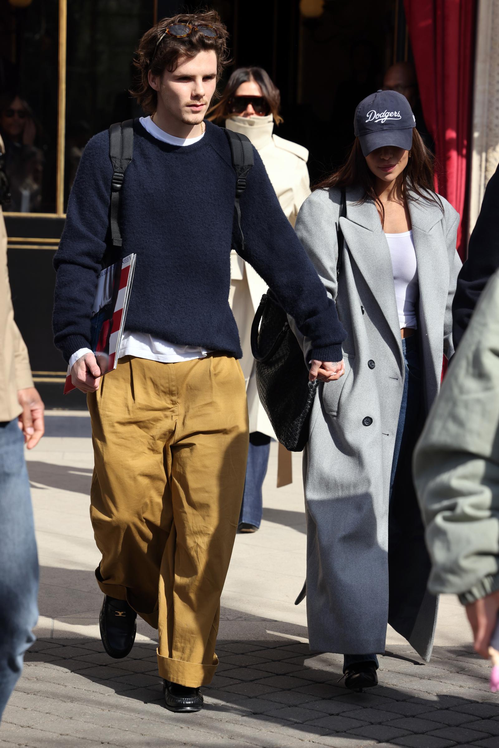 Cruz Beckham and Jackie Apostel leaving their hotel during Paris Fashion Week in Paris, France on March 8, 2025. | Source: Getty Images