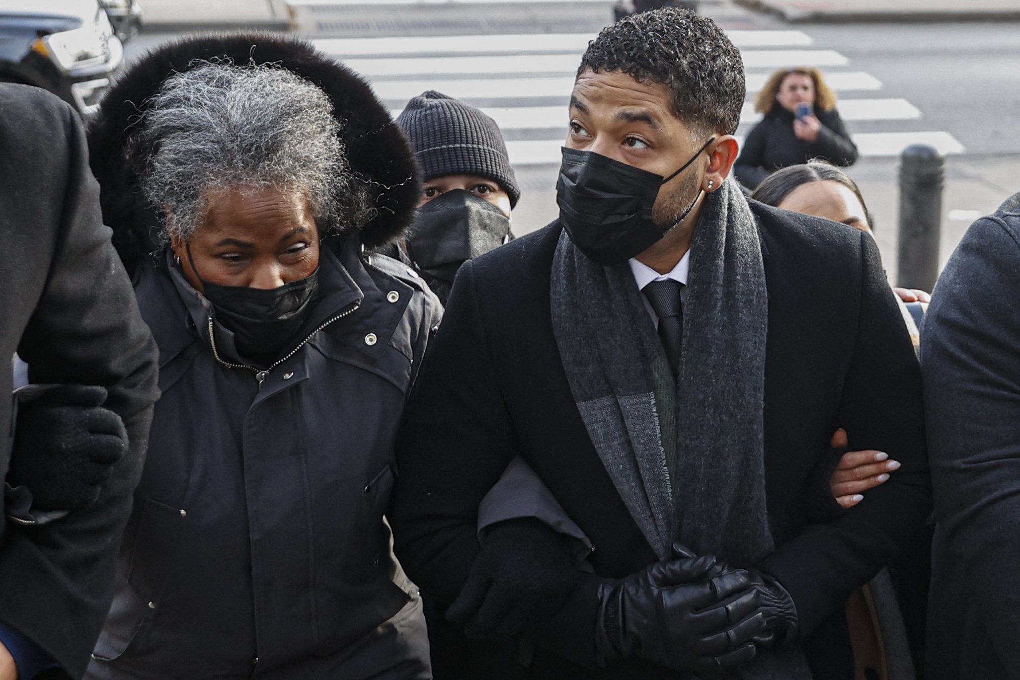 Jussie Smollett in arms with his mother Janet Smollett at the Leighton Criminal Court Building, in Chicago, Illinois, for his trial on disorderly conduct charges on December 7, 2021. | Source: Getty Images