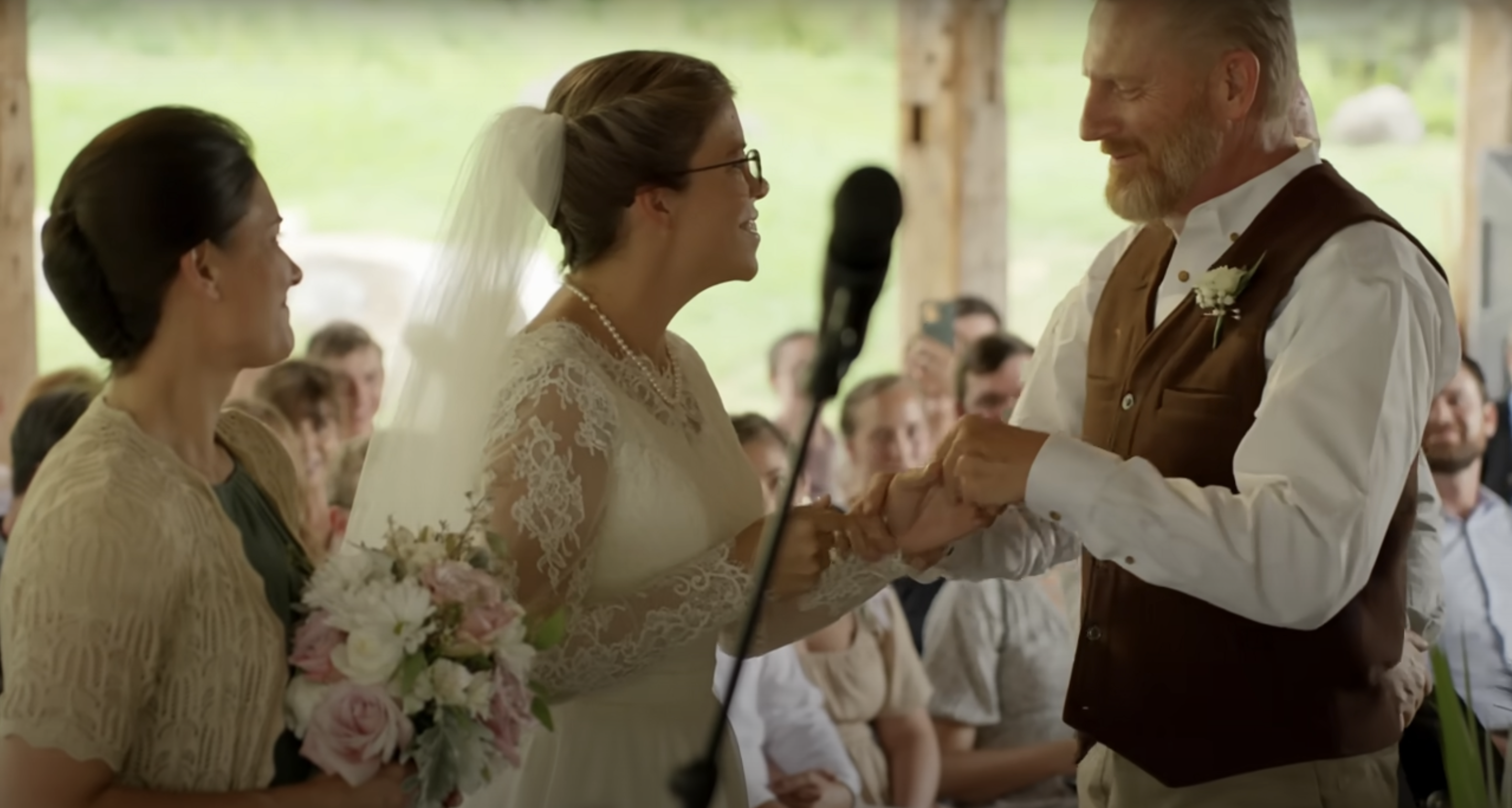 Rory and Rebecca exchanging vows | Source: YouTube/@RoryFeek