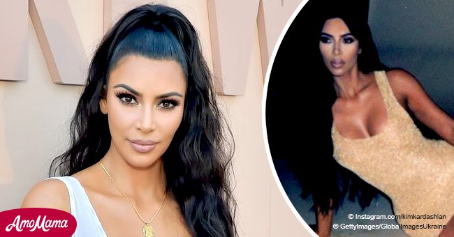 Kim Kardashian dons a tiny dazzling gold dress, putting her slender legs on full display