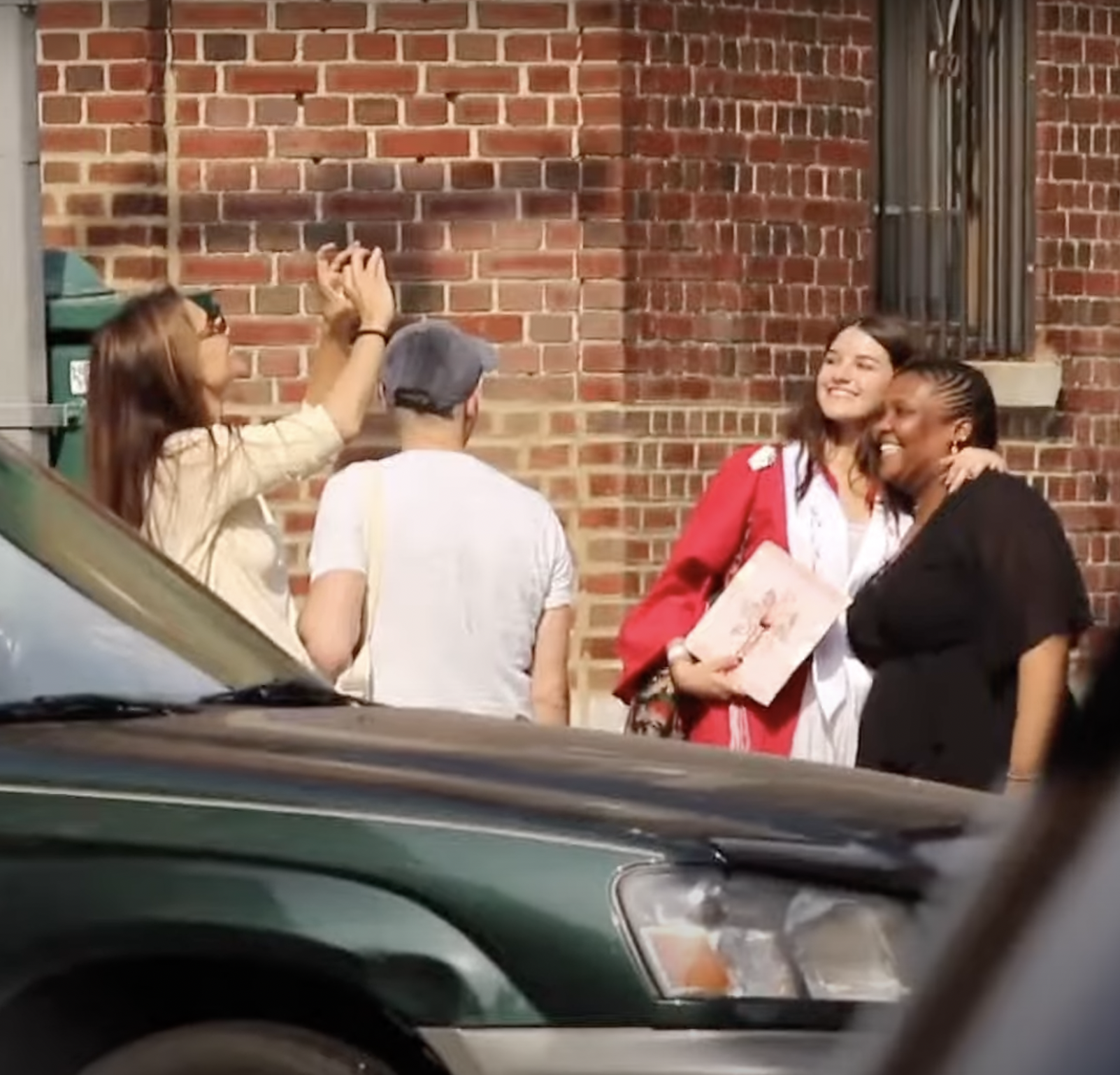 Katie Holmes, Suri Cruise, and two friends celebrate the teenagers high school graduation with classmates in New York City in a post dated June 22, 2024 | Source: YouTube/Page Six