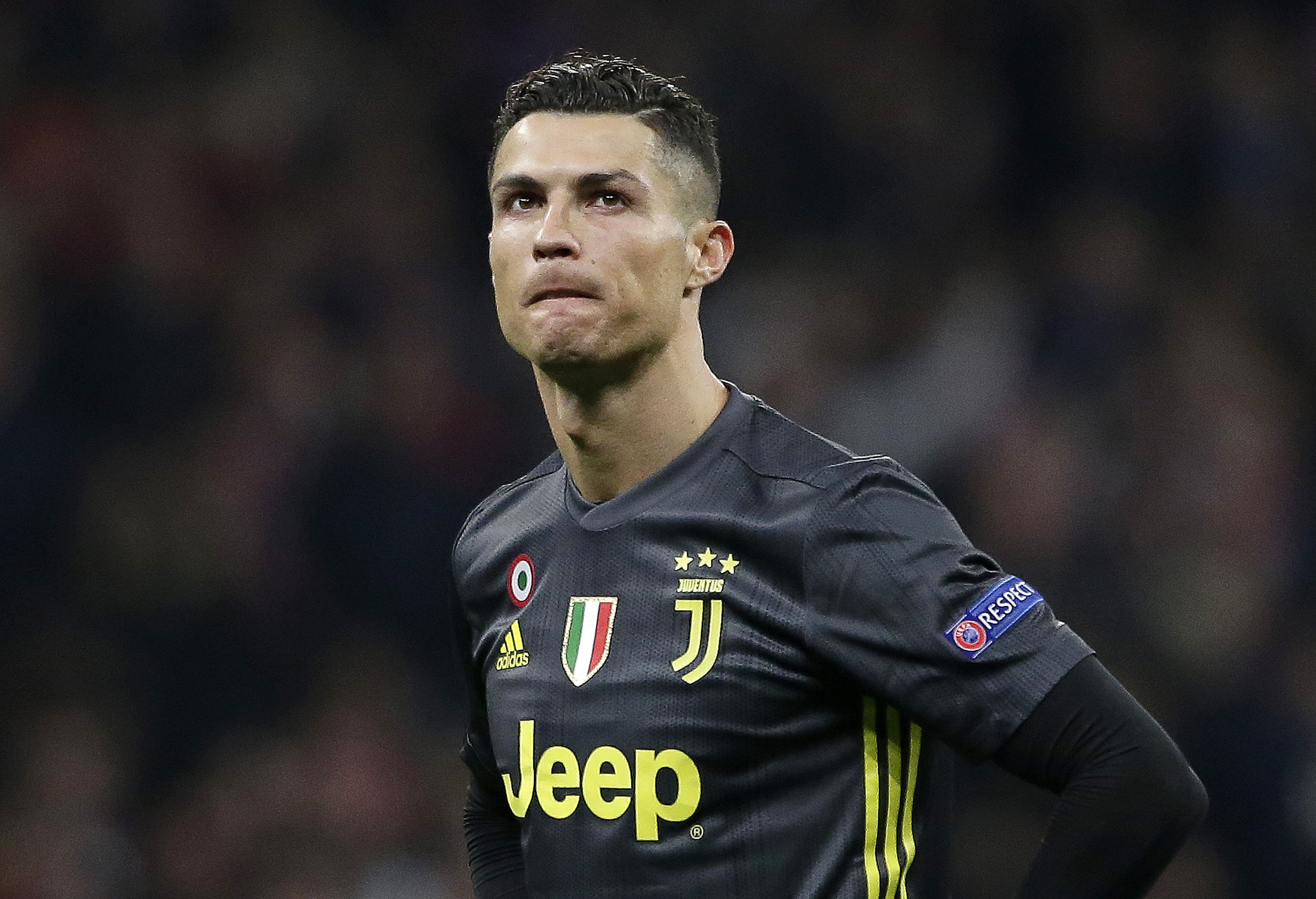 Football star Cristiano Ronaldo looking dejected during a match between Club Atletico de Madrid and Juventus at Estadio Wanda Metropolitano on February 20, 2019 in Madrid, Spain | Photo: Getty Images