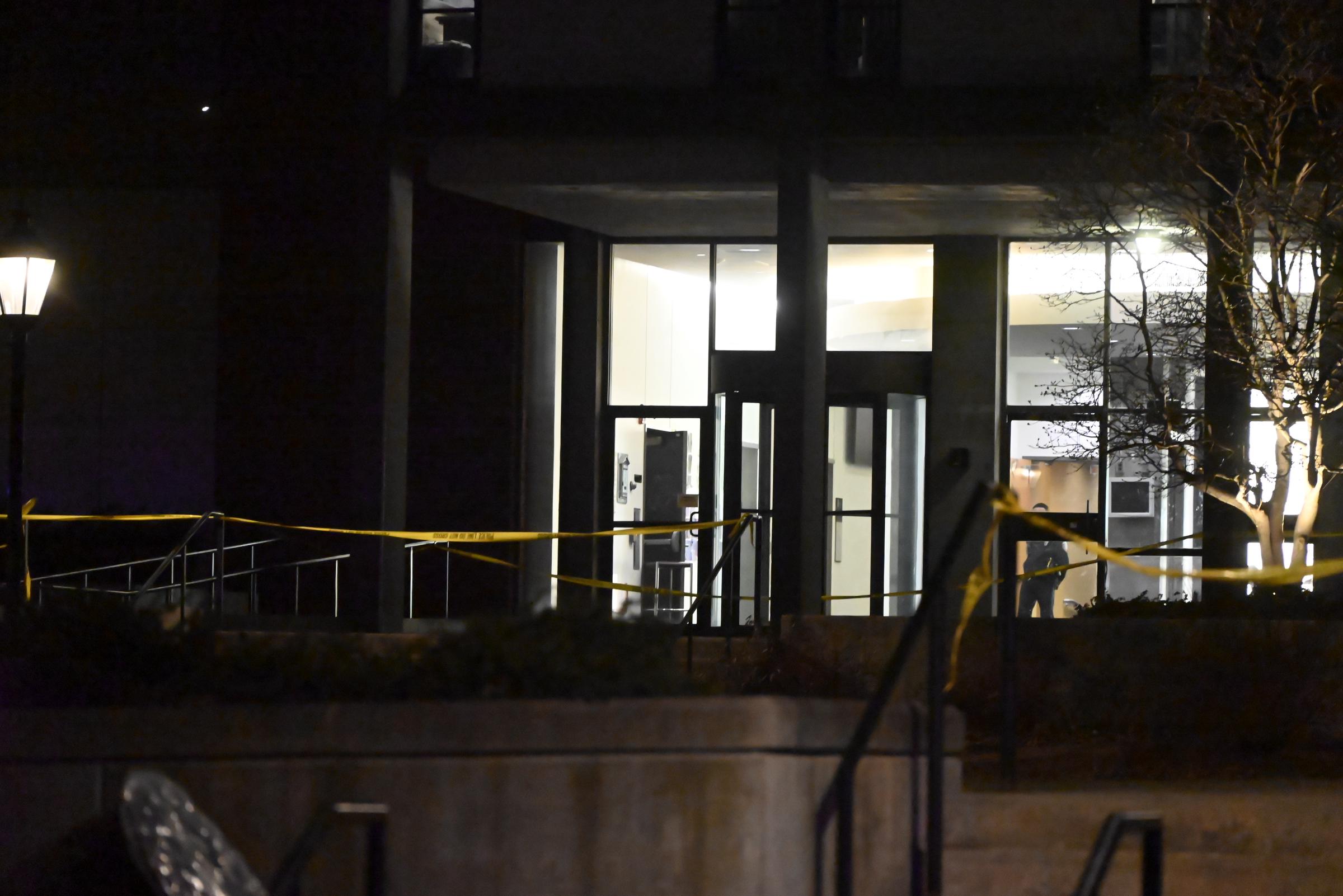 Emergency personnel work the scene, block off several buildings and establish a crime scene security cordon at Brown University on December 13, 2025, in Providence, Rhode Island, after a mass shooting | Source: Getty Images