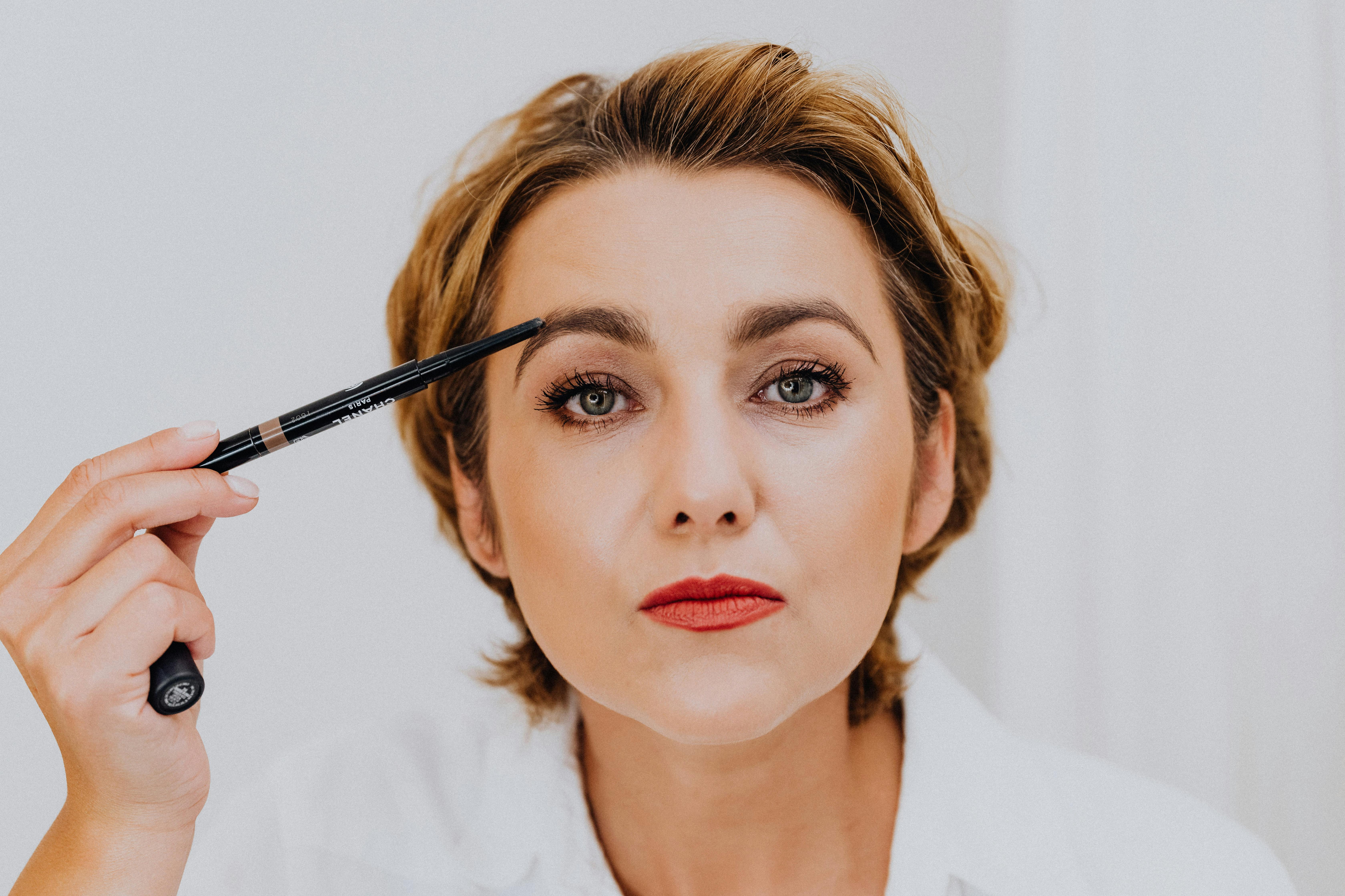 Use brown eyebrow product | Source: Pexels
