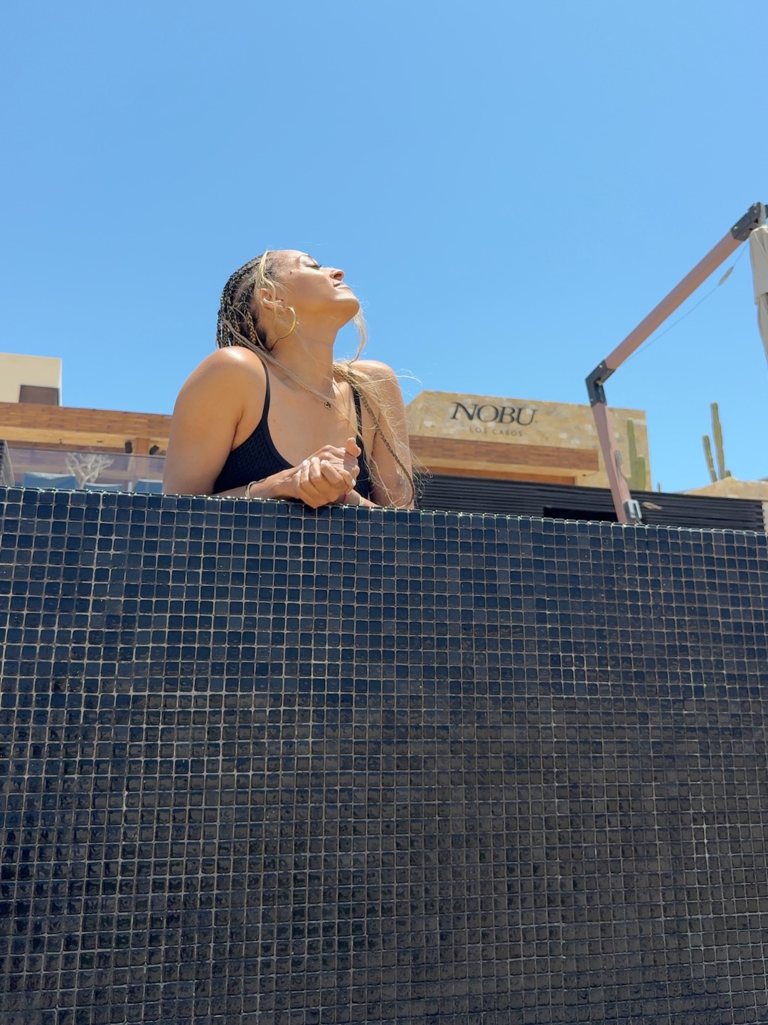 Tia Mowry soaks in the sun during her Cabo vacation, from a post dated May 28, 2026 | Source: Instagram/tiamowry