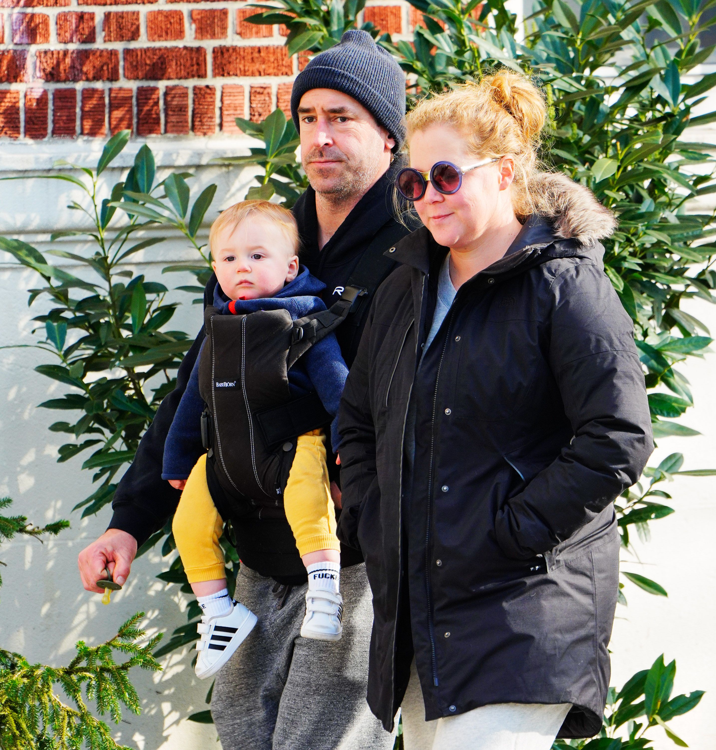 Amy Schumer and Chris Fischer with son Gene in March 2020 in New York City | Source: Getty Images