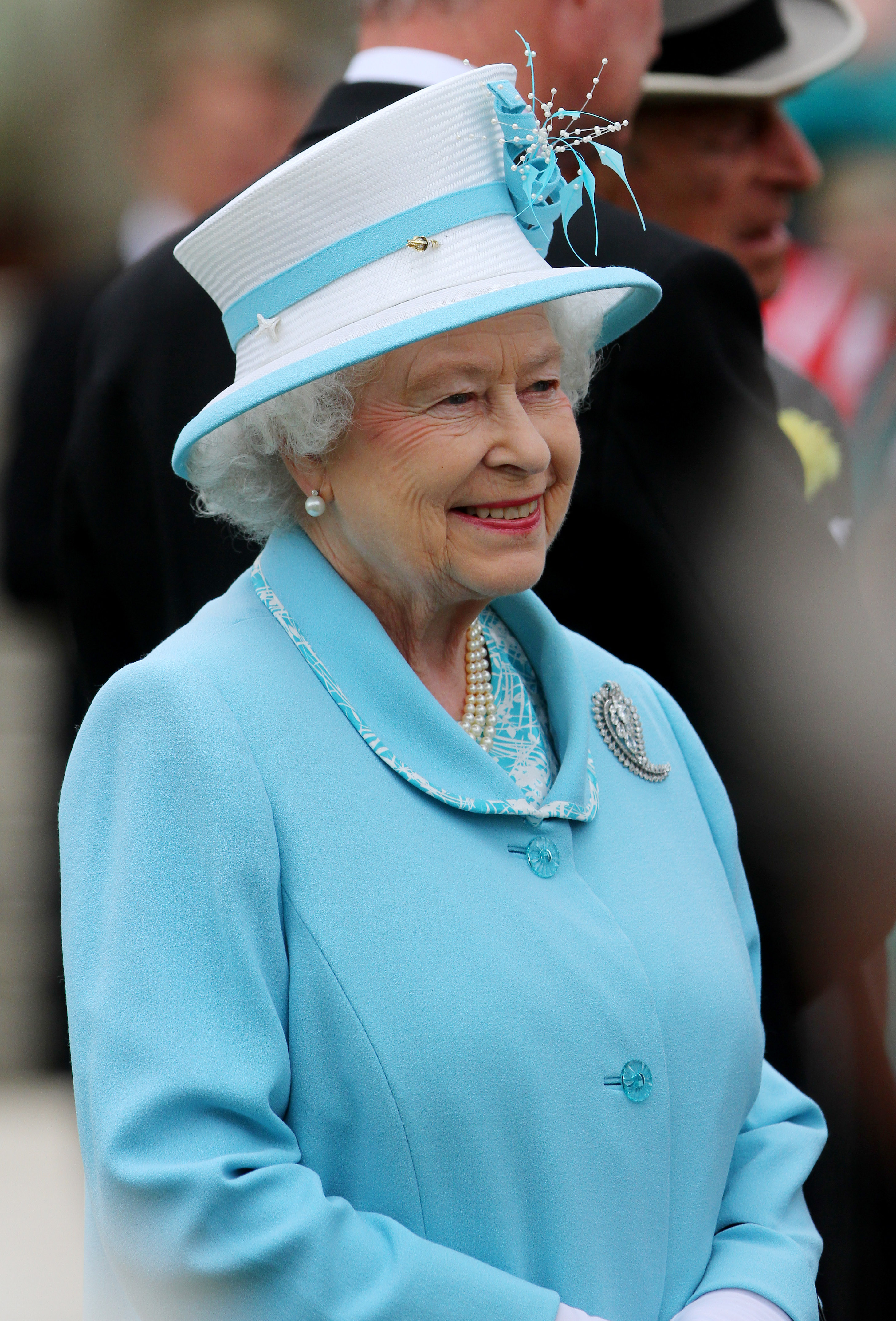 Queen Elizabeth II hosting a tea party in the gardens of Buckingham Palace in London, England on July 22, 2010 | Source: Getty Images
