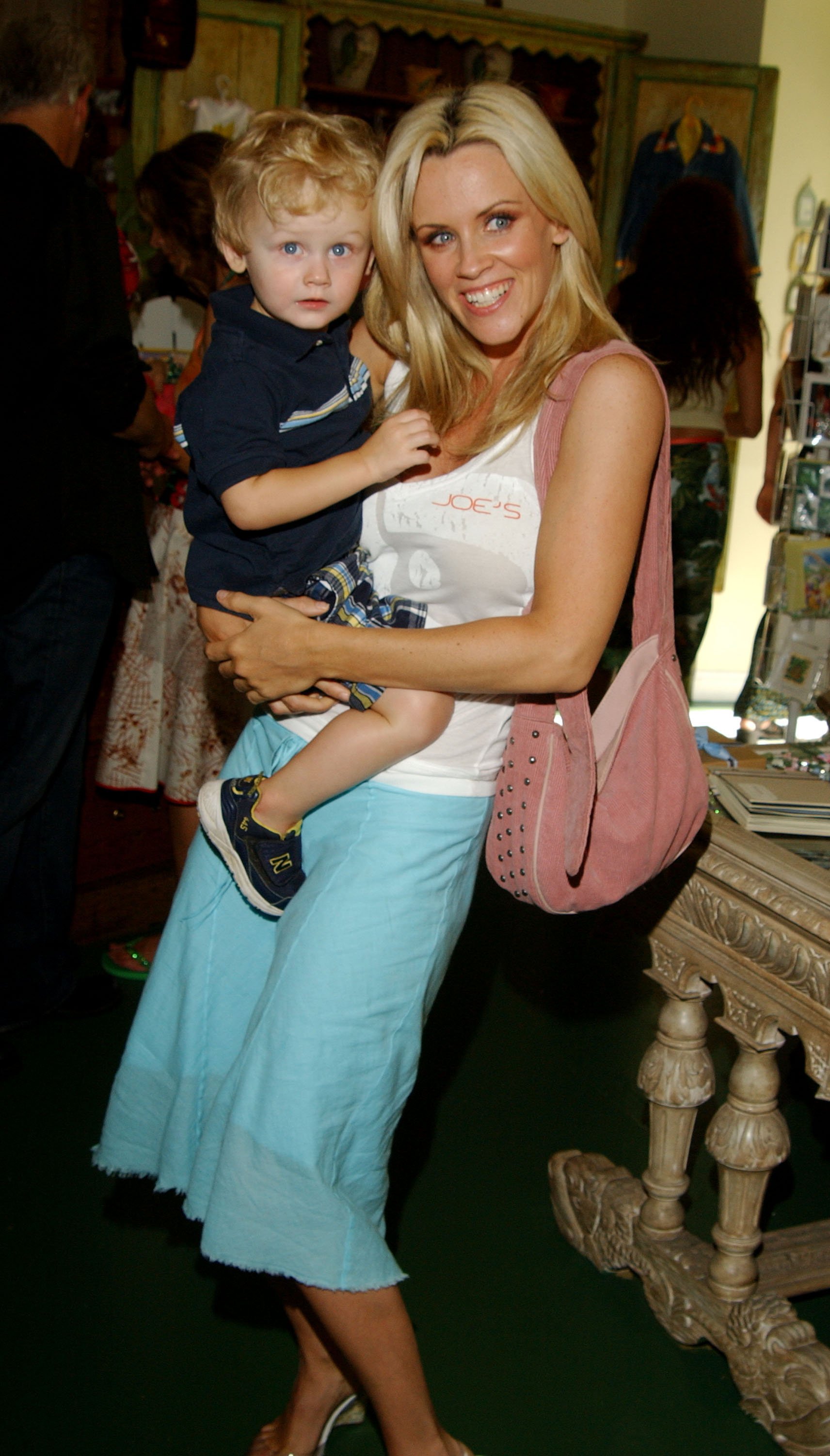 Jenny McCarthy and son Evan Asher during Connie Stevens, Joely Fisher and Tricia Leigh Fisher Open Nana's Garden at Nana's Garden in Beverly Hills, California, United States. | Source: Getty Images
