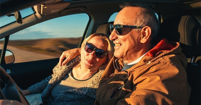 A senior couple traveling in a car | Photo: Shutterstock.com