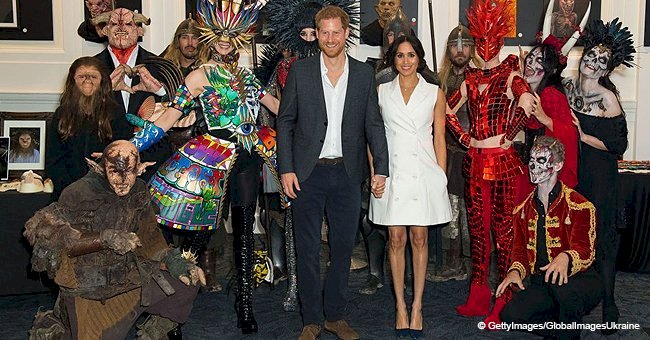 Meghan Markle shows off her gorgeous legs while being greeted by 'monsters'