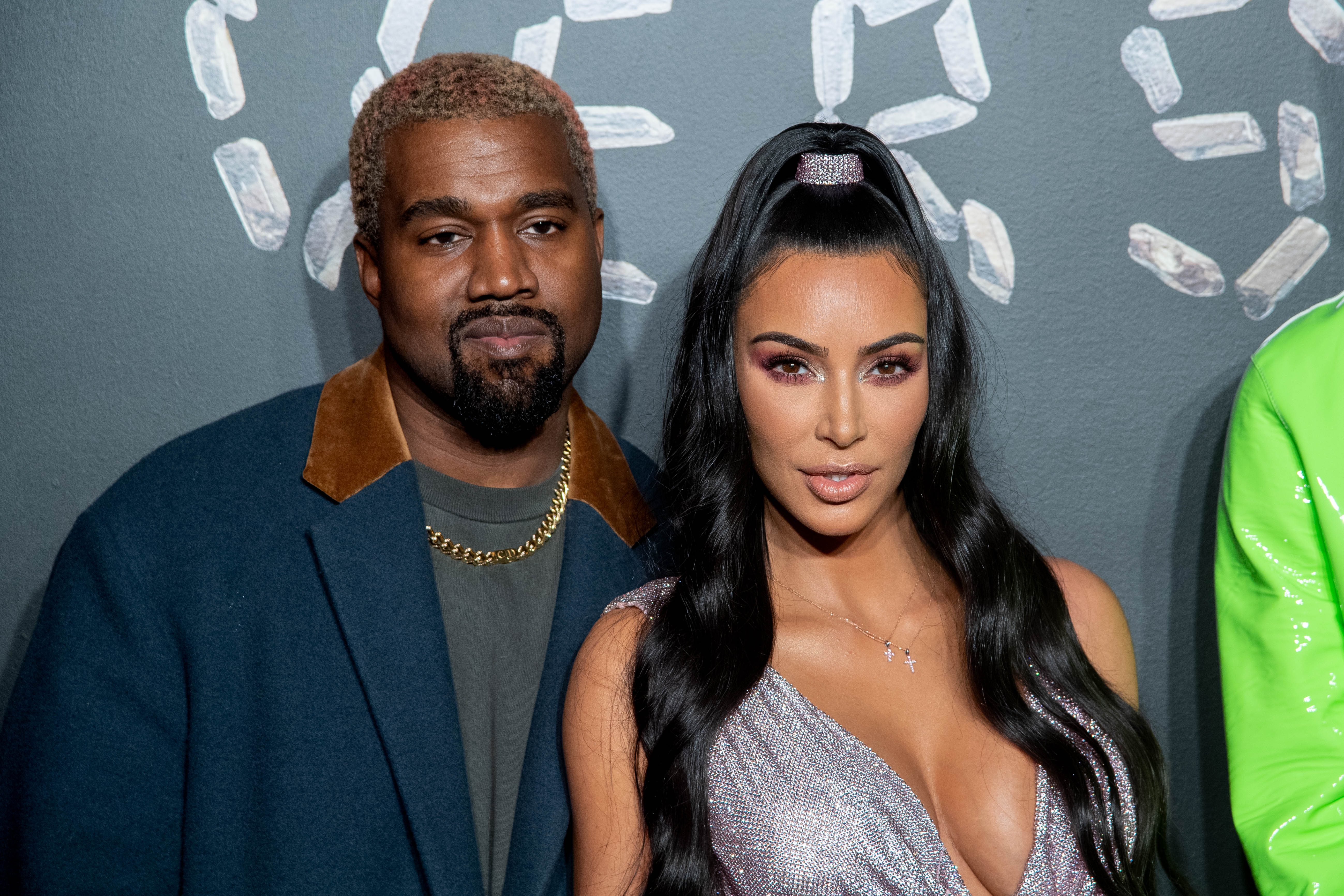 Kanye West and Kim Kardashian West at the the Versace fall 2019 fashion show held at the American Stock Exchange Building in lower Manhattan on December 02, 2018 in New York City | Photo: Getty Images