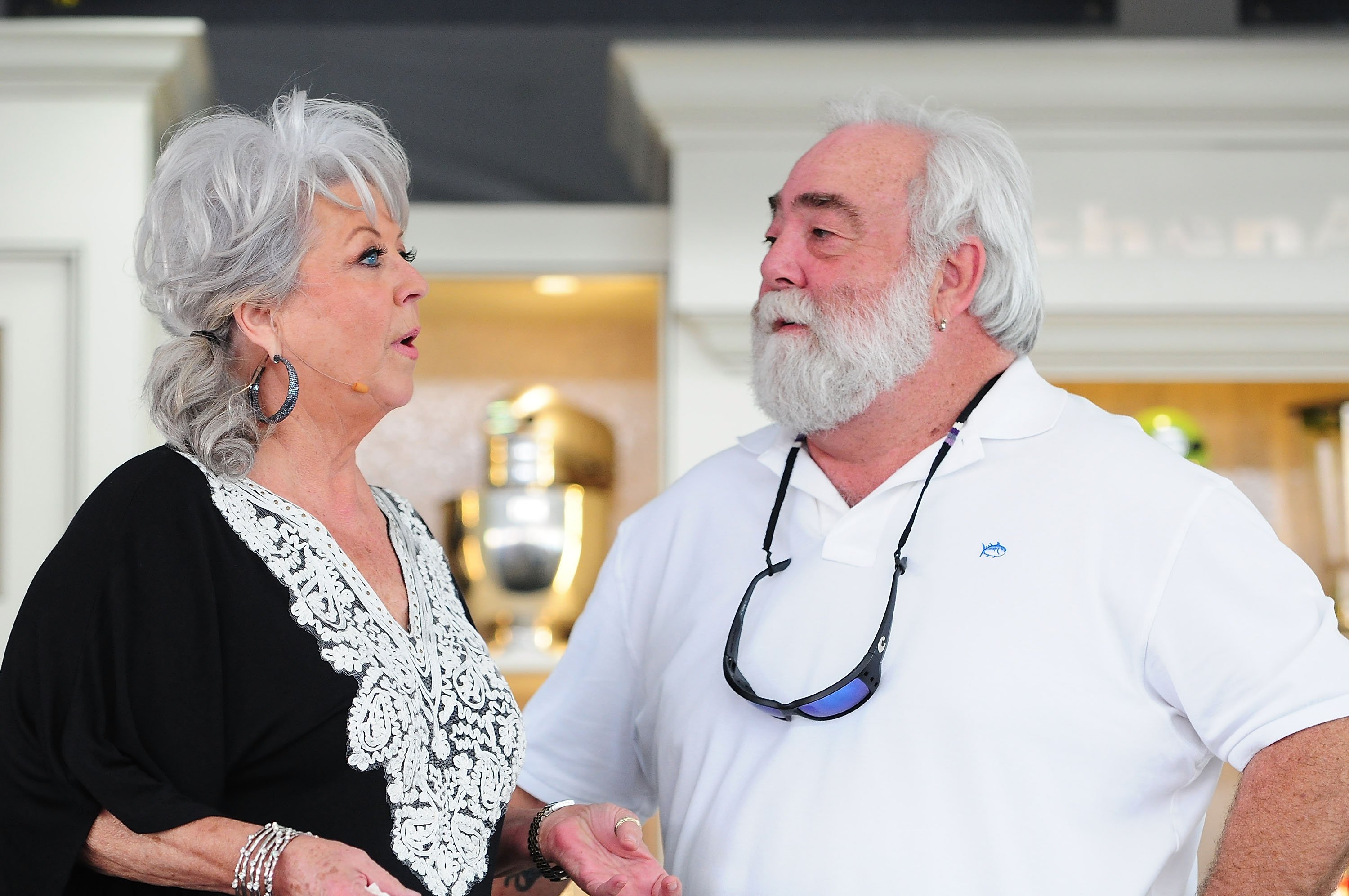 Paula Deen and Michael Groover at the Whole Foods Grand Tasting Village at the 2012 South Beach Wine and Food Festival on February 26, 2012 in Miami Beach, Florida. | Source: Getty Images