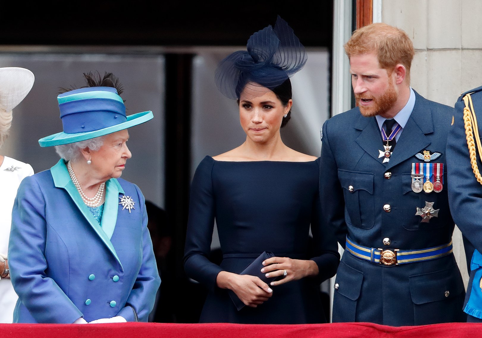 La reine Elizabeth II, la duchesse Meghan et le prince Harry lors du centenaire de la Royal Air Force, le 10 juillet 2018, à Londres, en Angleterre. | Source : Max Mumby/Indigo/Getty Images